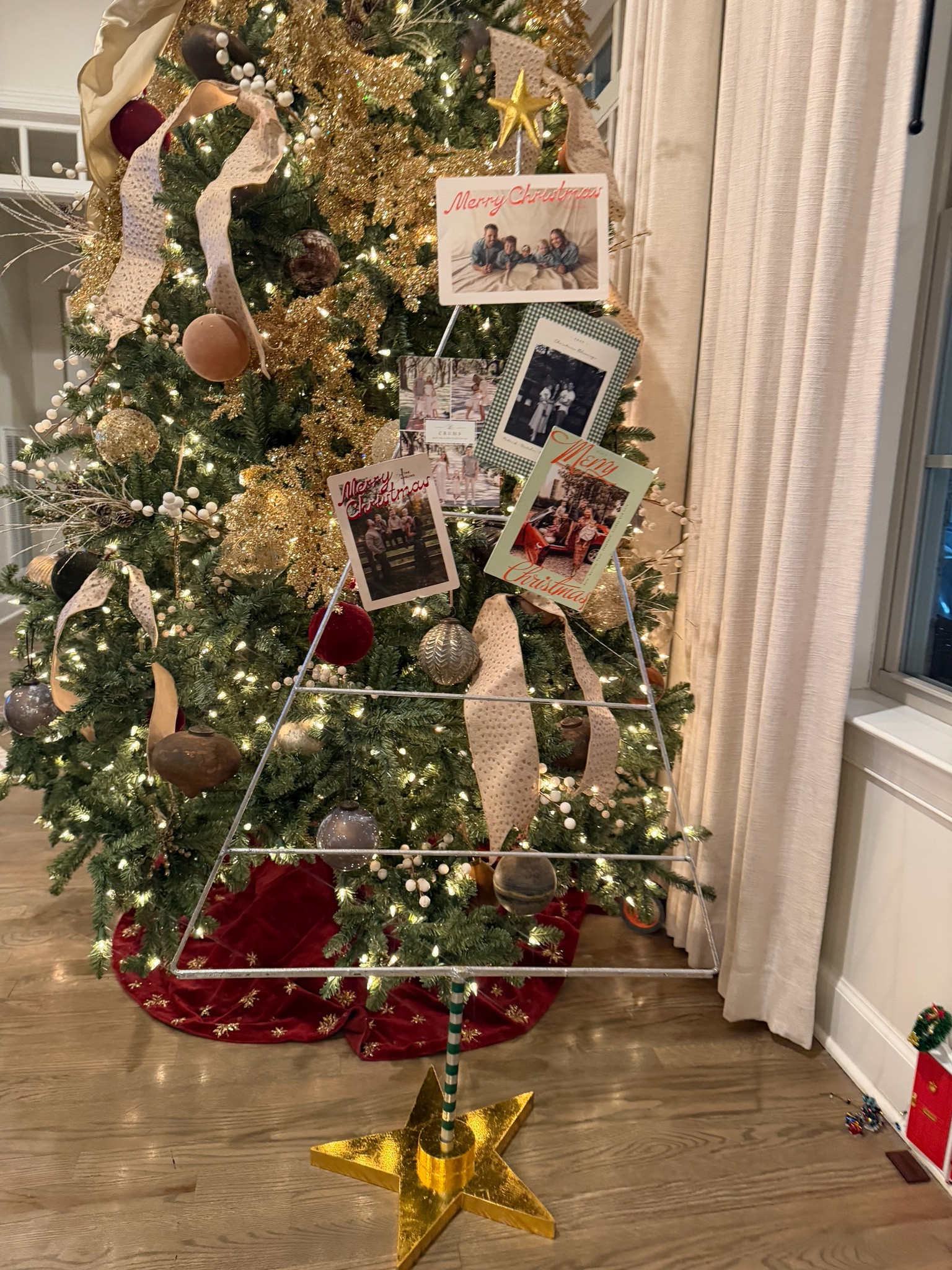 How I'm storing the Christmas cards this year! Love this little ornament tree from Mackenize Childs! 

 #LTKHoliday #LTKHome
