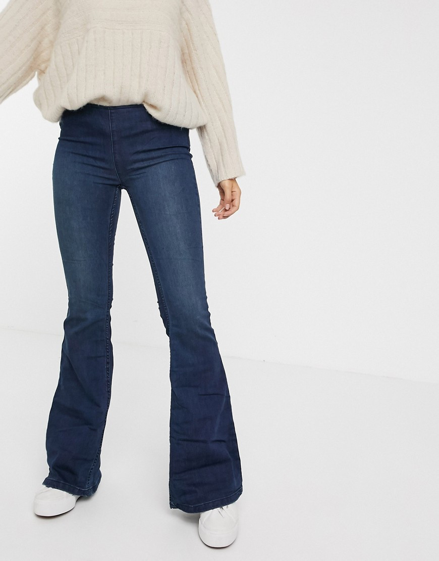 Free People Penny flare jeans in light wash blue-Black | ASOS (Global)