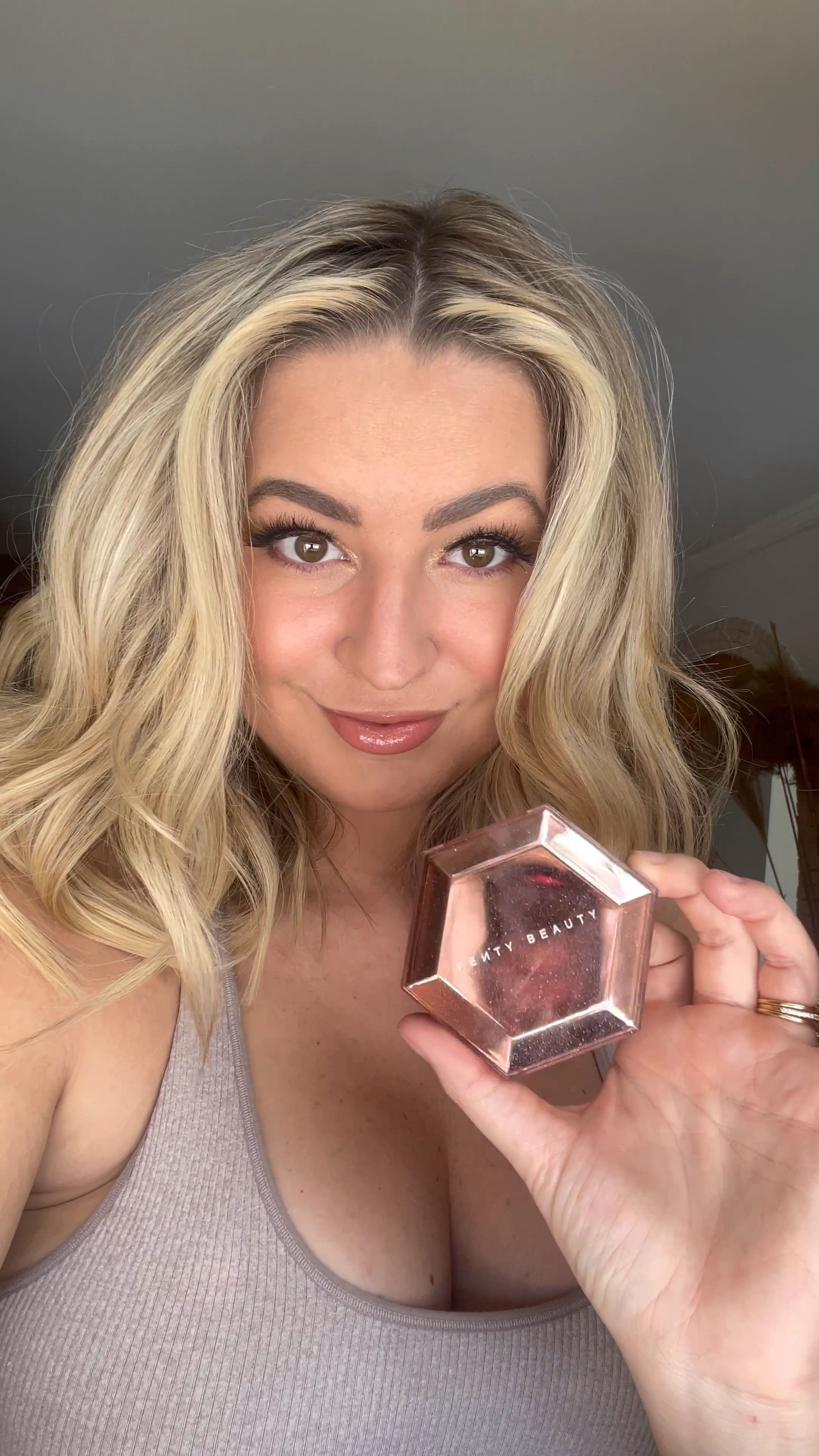 Fenty Beauty Diamond Bomb: Dewy Skin, Light Highlighter 

#LTKFestival #LTKbeauty #LTKFind