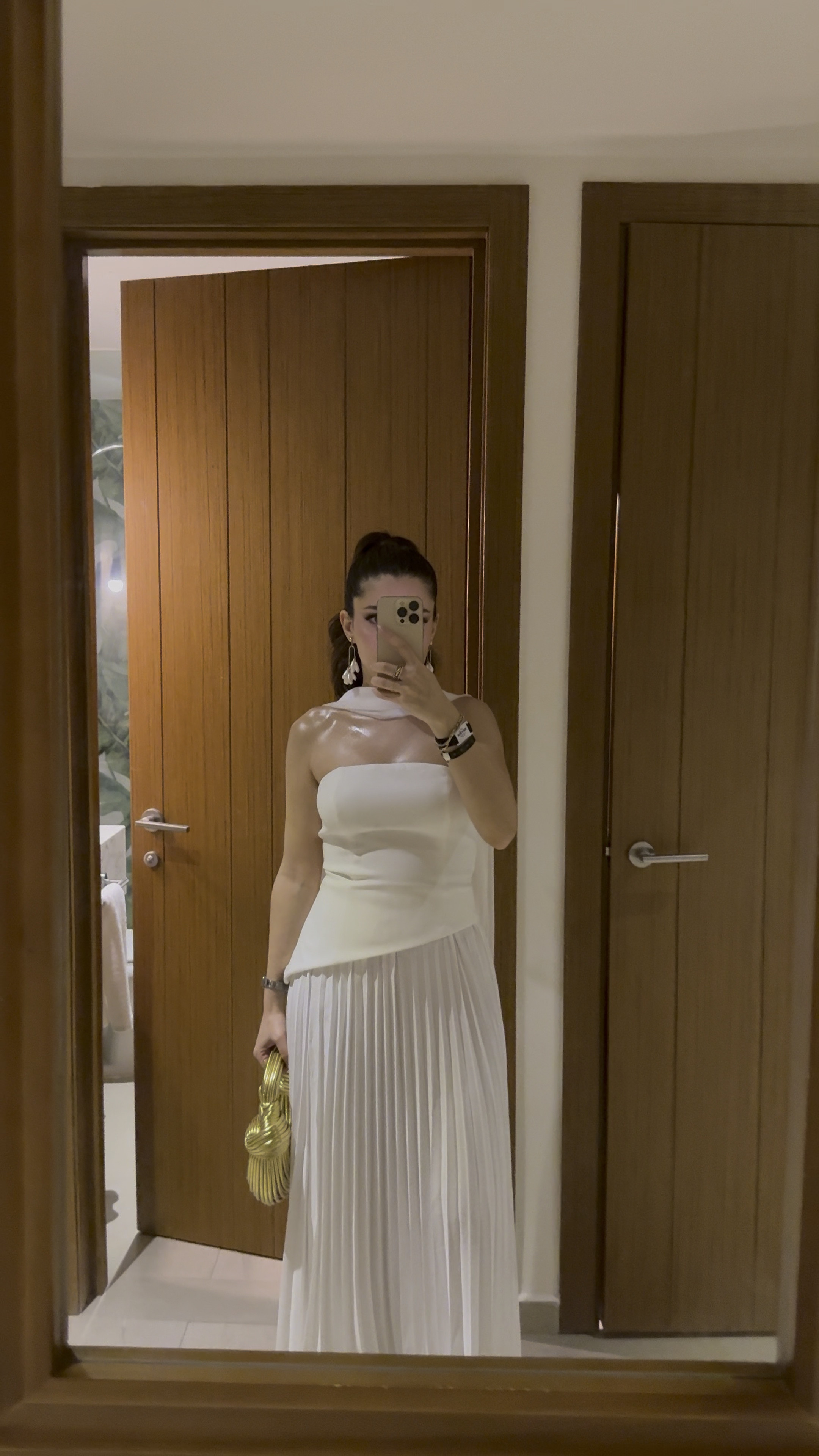 White maxi dress with gold accessories 

#LTKMostLoved #LTKStyleTip