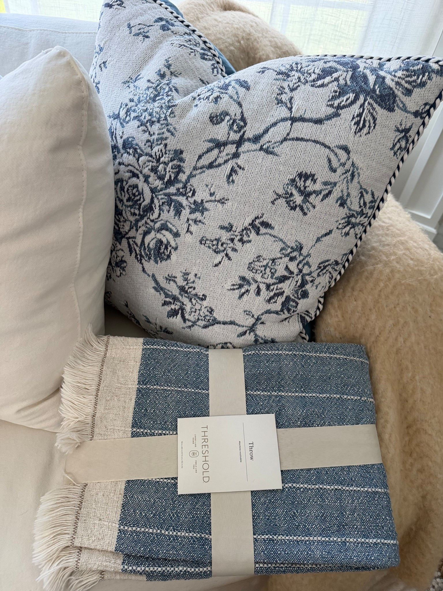Sneak Peak! 
I added a bit of color to my family room decor for Spring!

Follow along to see how I organically infused blue into my neutral, white & beige space without it looking forced or disconnected 🩵  
@homeswithchristina

PS: my new floral throw pillow has the most stunning shades of blue! The pillow cover is thick and high quality with a solid blue back and pretty braided piping detail. 

Oh and you don’t have to think about purchasing a pillow insert separately because this INCLUDES the insert!

. . . And IT GETS BETTER! 👉🏻  BOTH the pretty knit throw blanket and floral accent pillow are ON SALE right now at @Target ! 

🏃🏽‍♀️ 🏃 RUN before they sell out! 🏃🏽‍♂️ 

#LTKHome #LTKSeasonal #LTKSaleAlert