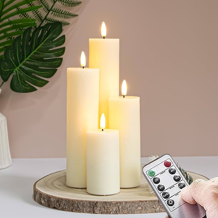 Flickering Flameless Pillar Candles with Remote Control and Cycle Timer,Ivory Pack of 4 Battery O... | Amazon (US)