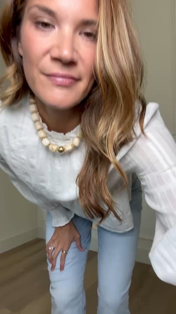 This white blouse has such pretty texture with the smocked waist, subtle stripes, and ruffle details. Paired with long length light wash jeans, it’s an easy early fall outfit that works just as well for the office as it does for dinner plans.

Size M

Tall girl outfits, White blouse, Smocked waist top, Tall friendly clothing, Long length jeans, Light wash denim, Early fall outfits, Business casual style, Jeans and a nice top, Work outfit ideas, 6 foot style, Stang and Co

#LTKootd #LTKSeasonal #LTKTall