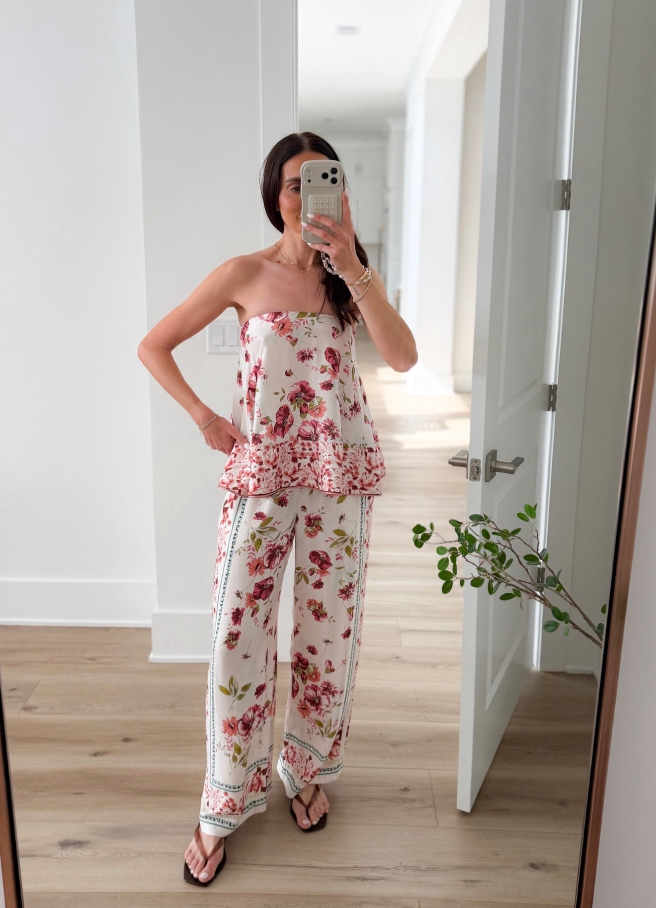 this set is giving effortless vacation energy. the strapless top with the flowy wide leg pants is so flattering and easy, and the print feels elevated without trying too hard. lightweight, breathable, and perfect for packing. wear it to dinner, walking around on vacation, or even dress it down with flat sandals

matching set, vacation outfit, floral set, resort style, easy summer look, travel outfit, annabrstyle 

#LTKSeasonal #LTKTravel #LTKootd