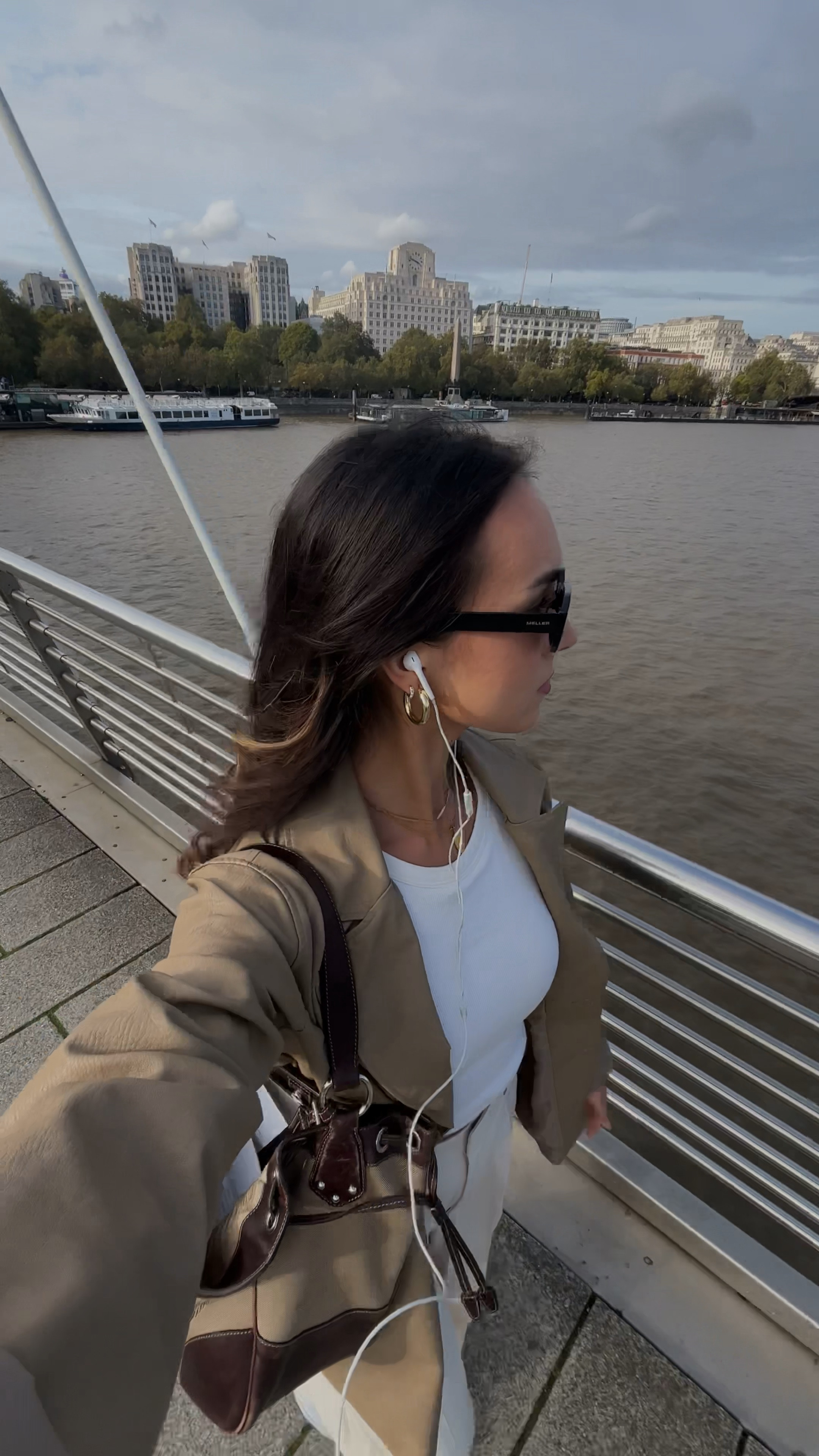 🇬🇧 London calling - heartless curls + NA-KD taupe faux leather jacket + white padded tank top Uniqlo + cream straight leg trousers Uniqlo + vintage Prada brown and taupe handbag + blue and white sambas adidas