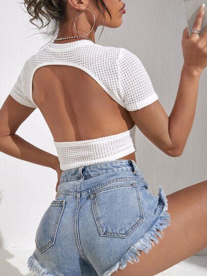 Cut Out Backless Crop Tee
   SKU: sw2204089477315457      
          (6 Reviews)
            US$5... | SHEIN