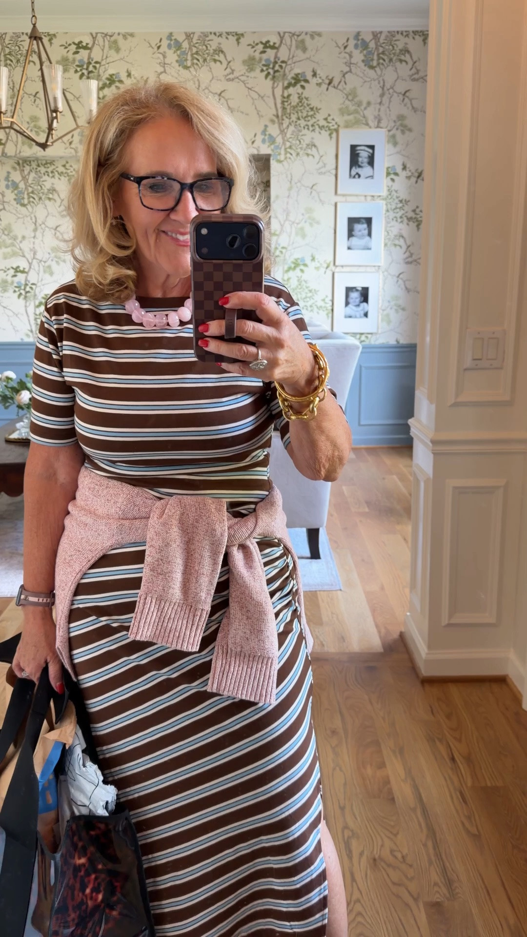 Dress size medium. Sweater size medium. Wear the sweater as the cardigan tied over your shoulders wrapped around your waist. It’s just a nice way to add an extra layer to the dress.

T-shirt dress fall transition dress wear now dress striped dress, brown and pink color combo

#LTKootd #LTKOver40 #LTKgrwm