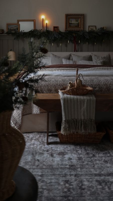 Christmas bedroom, blanket, linen, upholstered bed, rug, block print pillow covers, garland, gold bells 

#LTKhome #LTKSeasonal #LTKHoliday