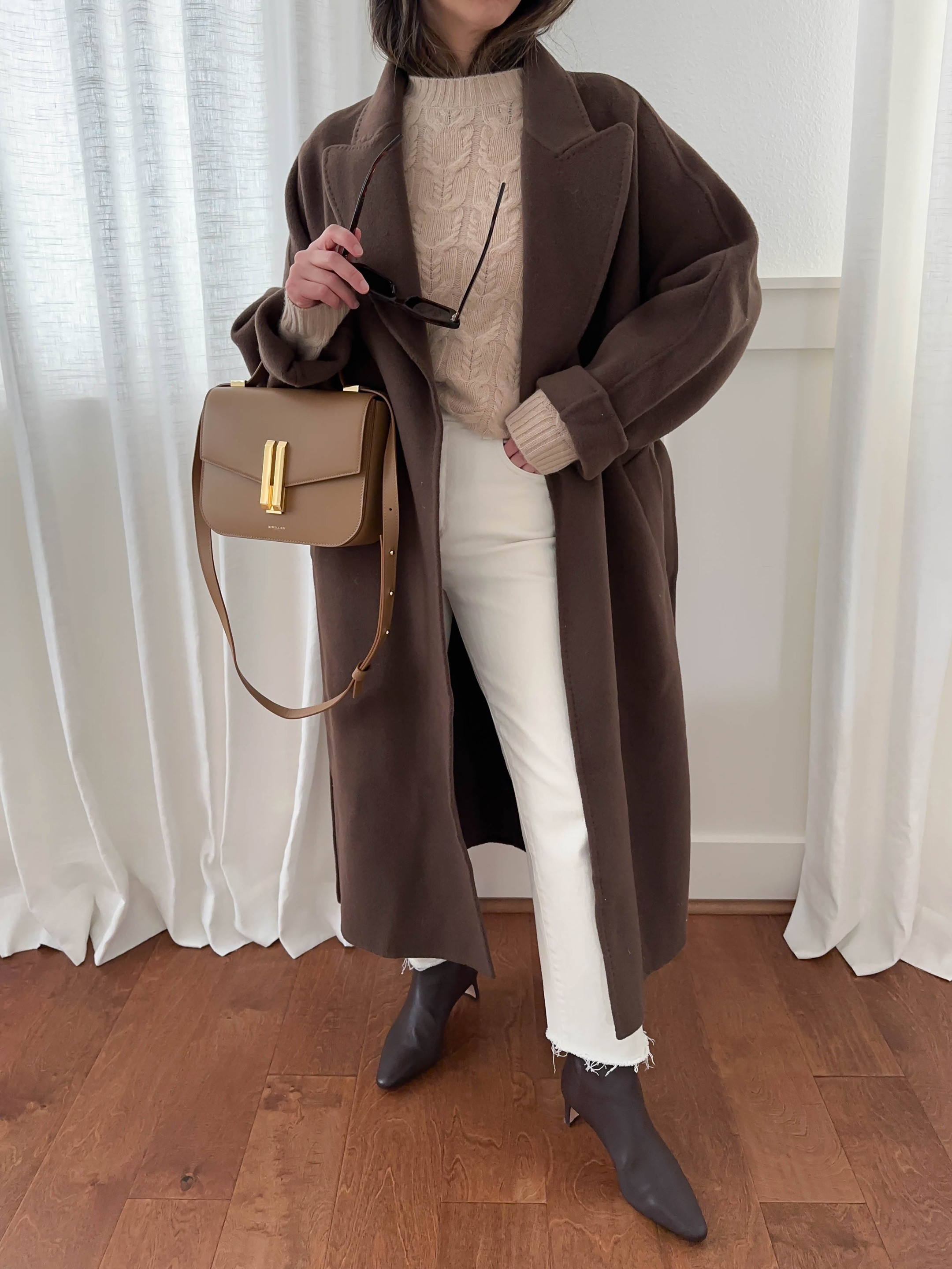 Cyber Monday! Lots of DeMellier bags on sale. This is a crossbody bag, I added some sunglasses nose stoppers to create the top handle. 

Blanking on coat brand. But no longer available. Linked other brown coats. 
Filoro cashmere sweater small (old)
DL1961 Jeans 25. Cut hems
J.Crew Stevie boots 5.5
DeMellier bag

#LTKSaleAlert #LTKCyberWeek #LTKSeasonal
