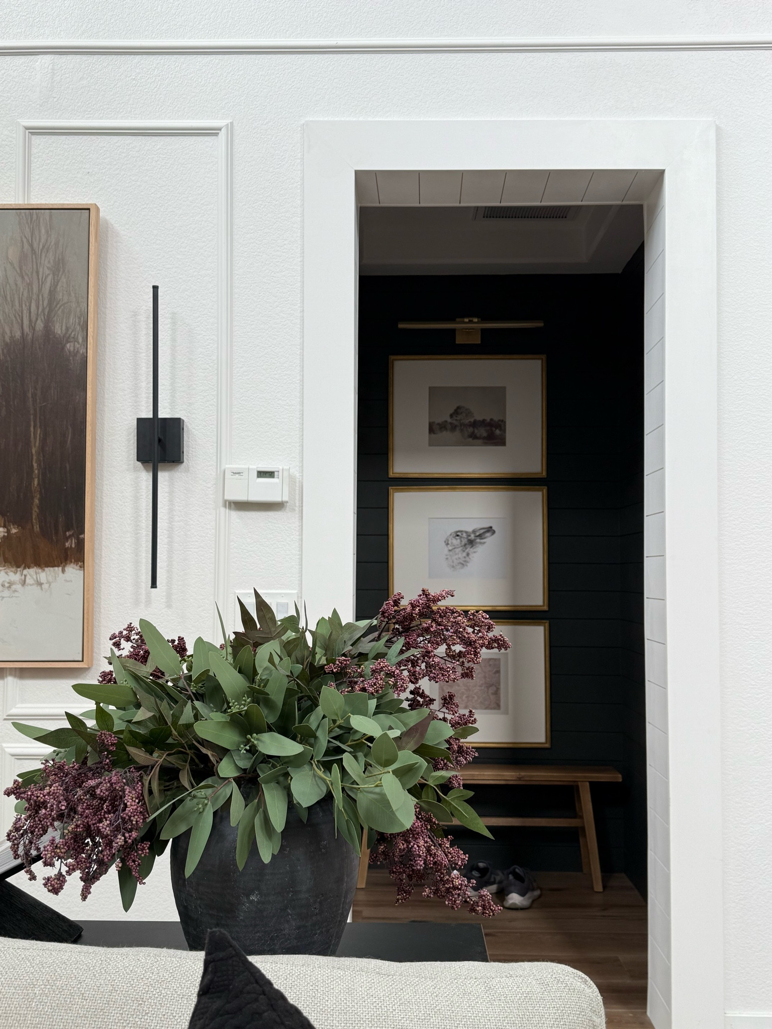 Hallway niche 

Picture frames 
Spring florals
Picture lights
Oversized art

I used gold rub n buff on my picture frames 

#LTKHome #LTKFindsUnder50 #LTKFindsUnder100