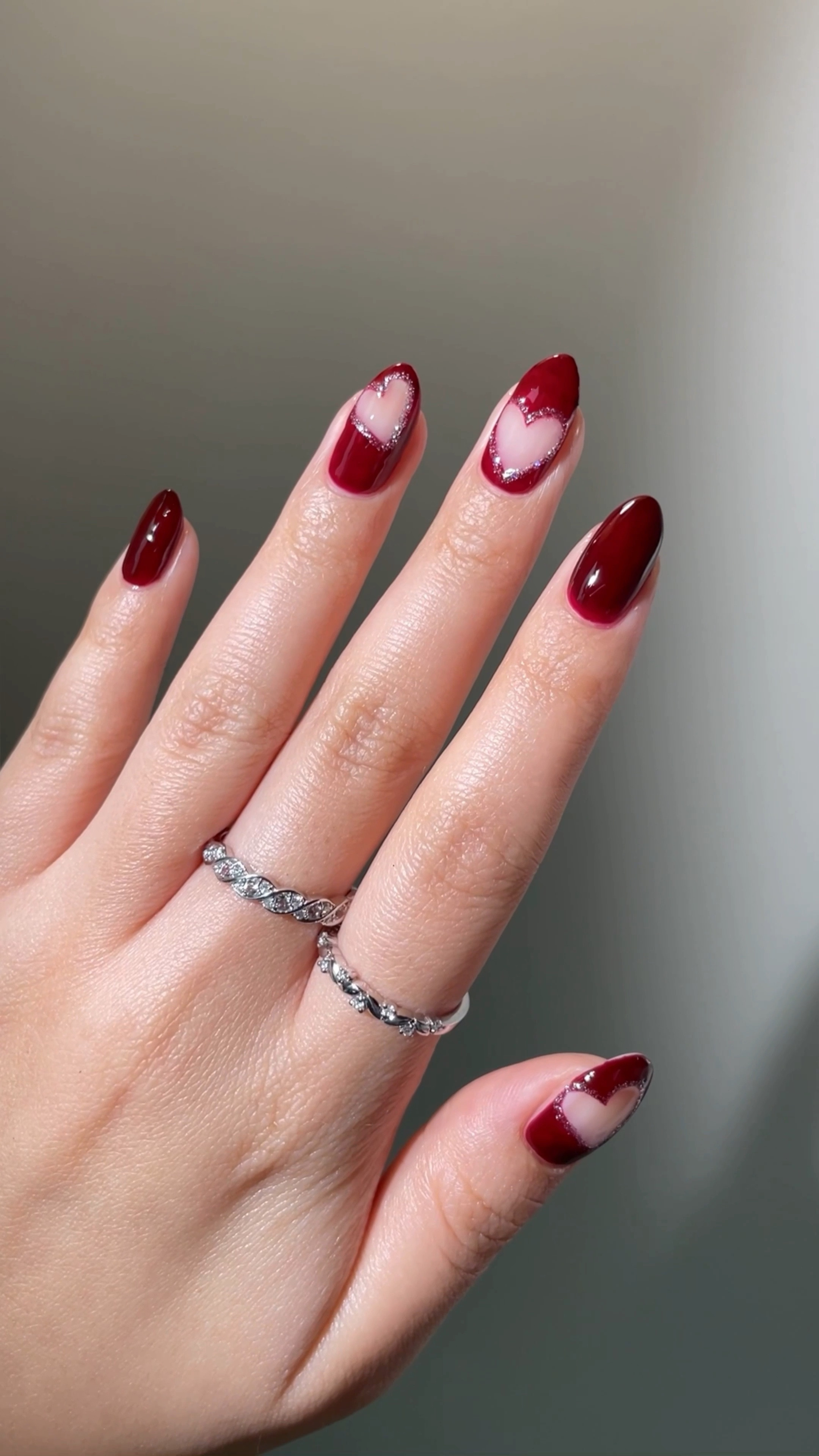 Cherry mocha heart nails for Valentine’s Day 🍒♥️ So cute and classy with a hint of holographic silver glitter. This is probably my favorite valentine mani of the year 🤭 red nail inspo, vday nails, glitter nails, red nail art, almond nails

Music: Liquid Honey by Brianna Haze

#LTKVideo #LTKwedding #LTKbeauty