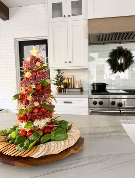 Holiday Appetizer Inspo!  This festive tree is sure to be a crowd pleaser and was so easy to make!  I ordered all the ingredients on the @walmart app and had them delivered!  It saves me so much time!

#walmartpartner #IYWYK #walmartgrocery Christmas holiday party

#LTKhome #LTKparties #LTKHoliday