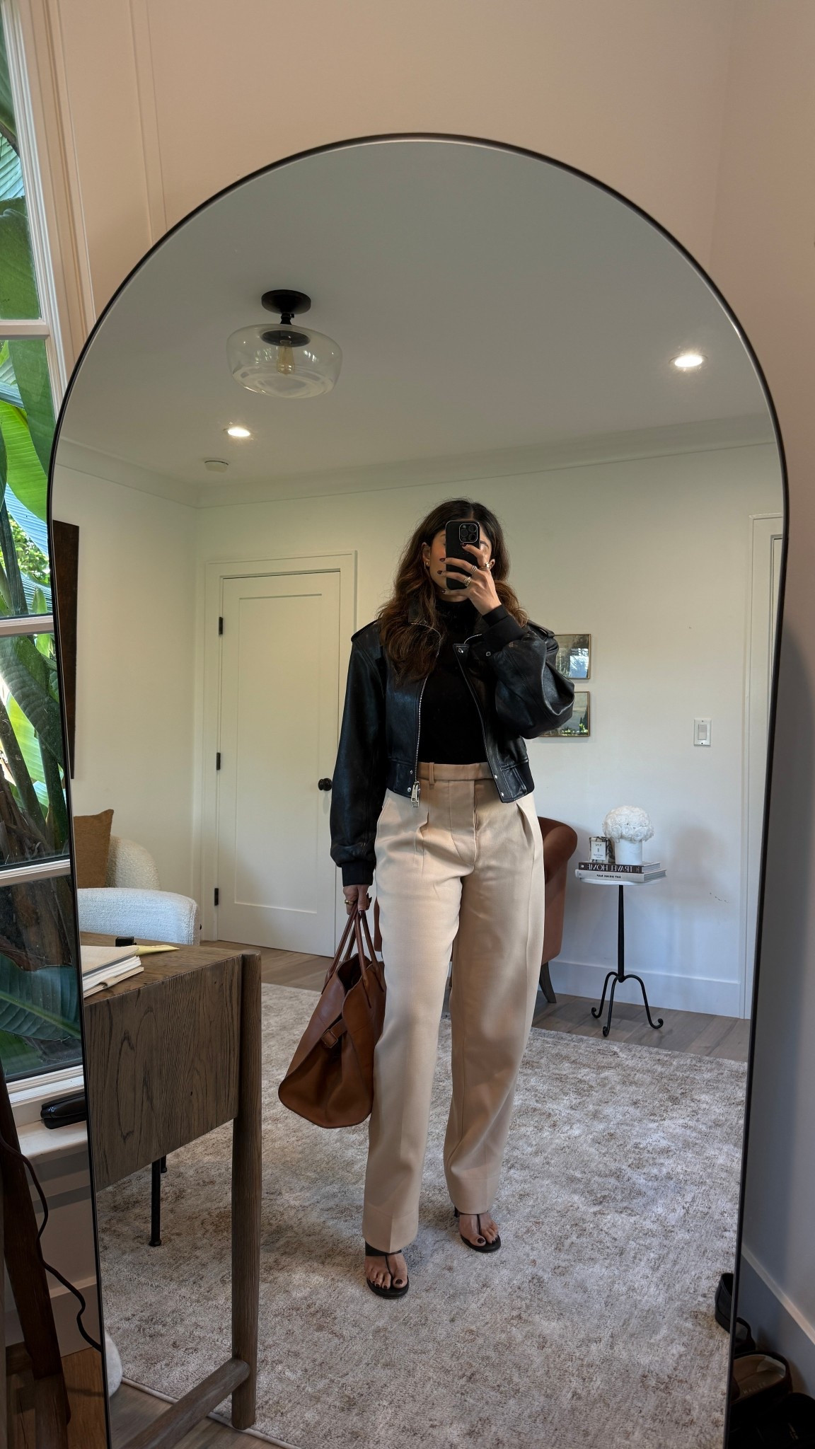 Barrel leg pants, black leather jacket 

#LTKSeasonal #LTKootd #LTKWorkwear