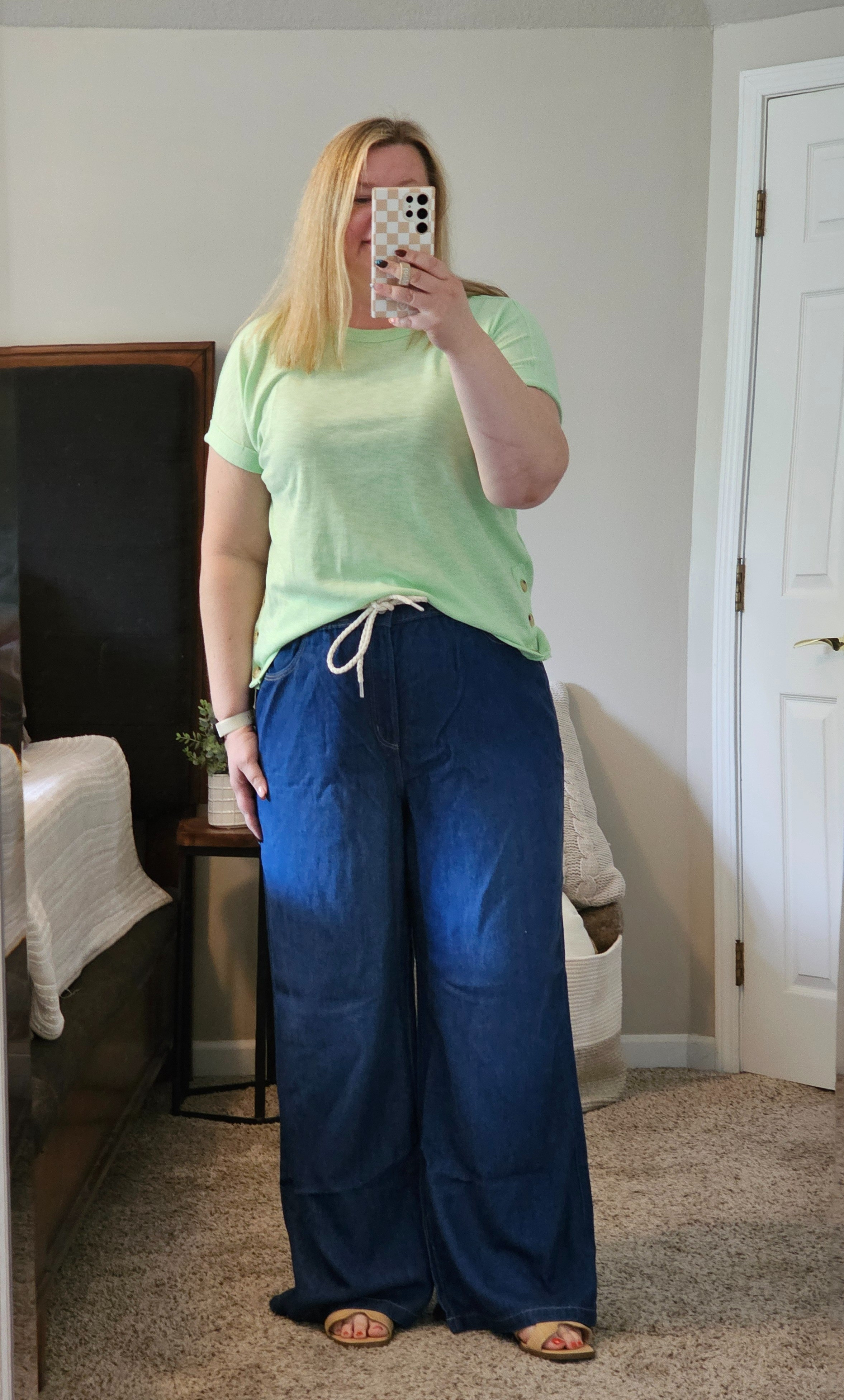 A perfect casual Spring/Summer look.  This side button top comes in a few colors but I loved the mint bright green.  Wearing an XL  These pallazo pants run long!  I am in an 18 regular length and 5'9 and they are dragging the floor.   They are a thinner material but the material weight is pretty heavy and not light and flowy. #hocspring

#LTKOver40 #LTKMidsize #LTKSaleAlert