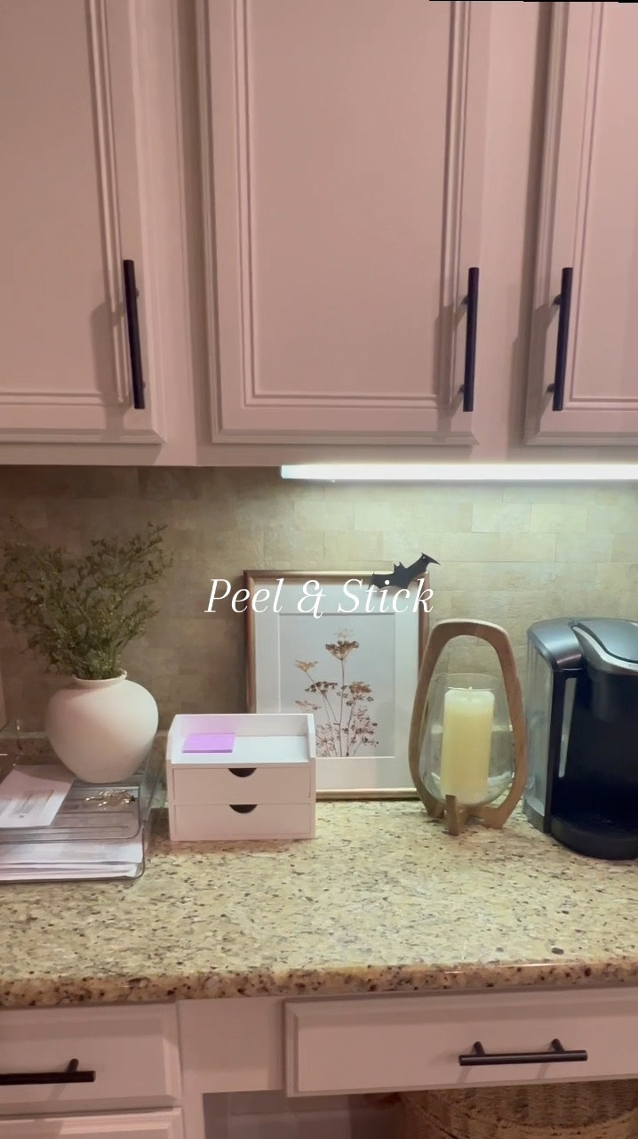I can’t believe how easy this peel and stick backsplash ended up being for my kitchen desk drop zone project. It simply adds a pretty put together look for this otherwise messy area that often gets slammed with mail, bills, and household goods. The material is easy to cut and customize to work around edges and outlets. 

#LTKVideo #LTKHome #LTKFindsUnder50