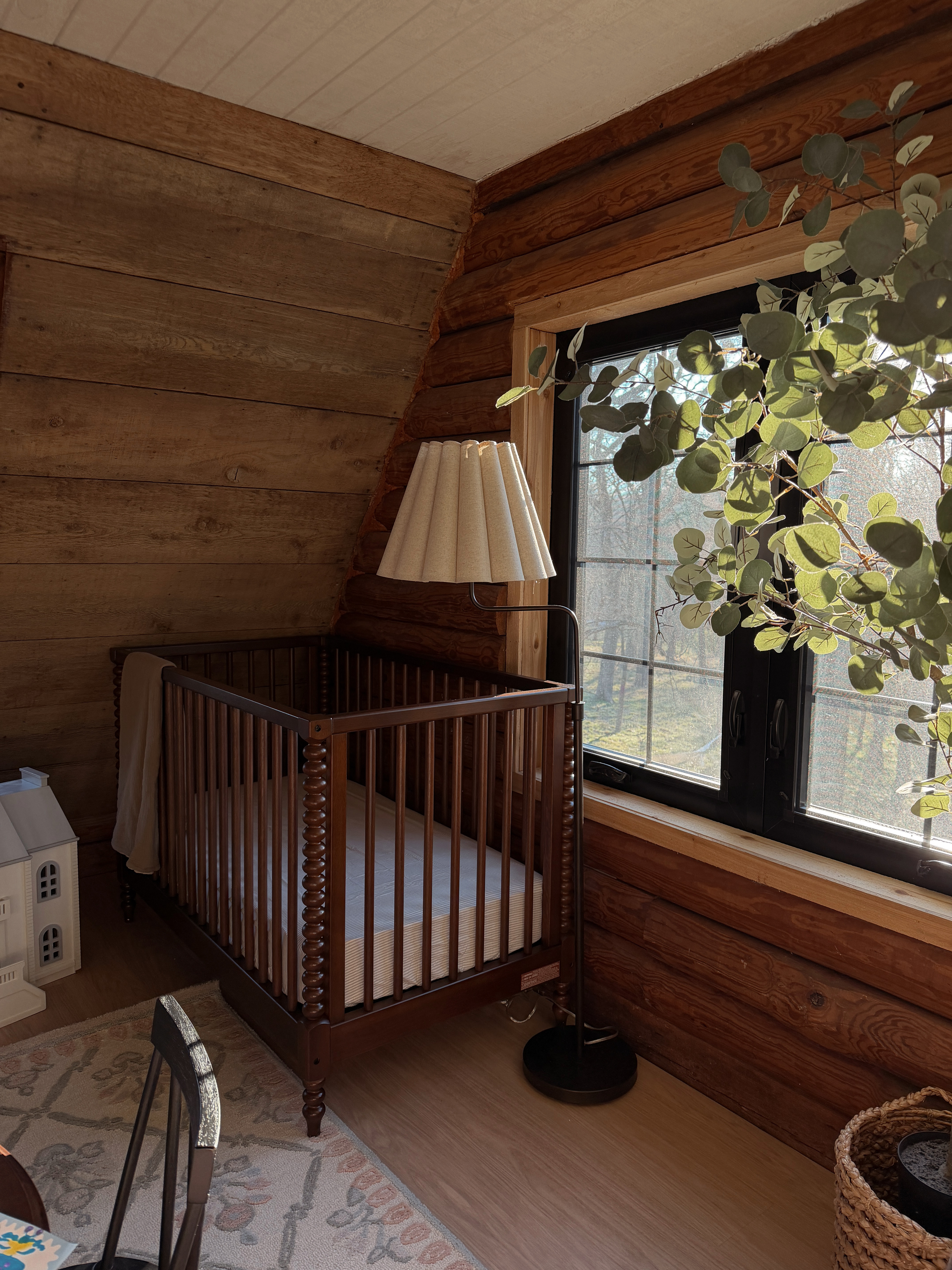 Sweet and simple nursery moments! This classic crib and linen lamp from Pottery Barn Kids make the coziest little corner. 

 #LTKHome #LTKBaby #LTKKids