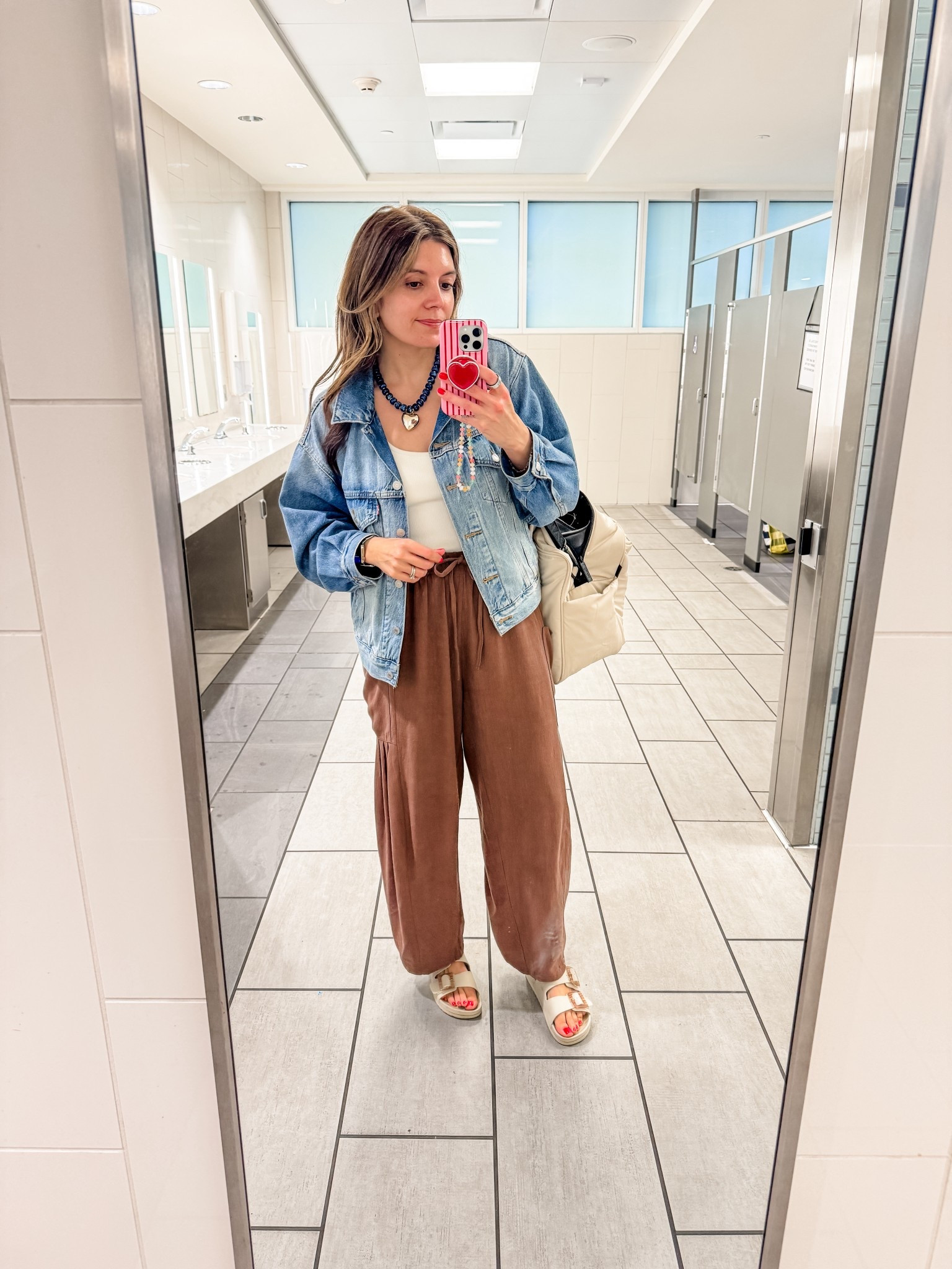 Travel outfit of the day! What I wore to the airport. Medium pants, medium tank, small Levi’s jacket. 

#LTKSaleAlert #LTKTall #LTKOver40