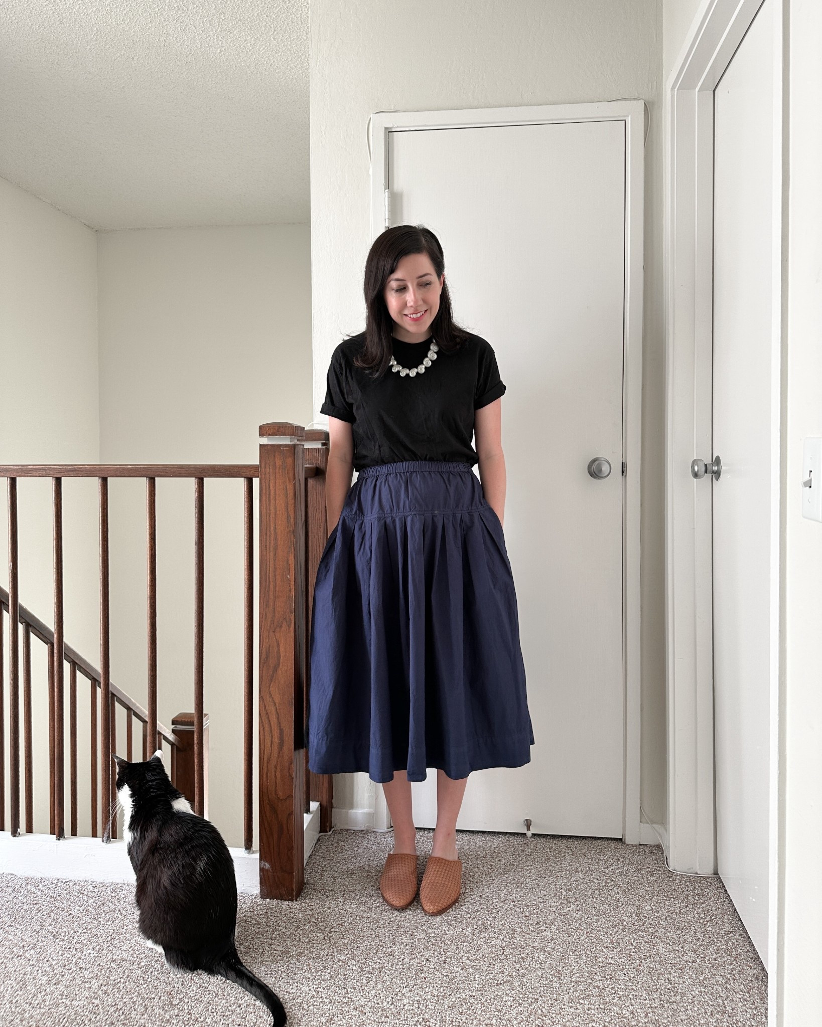 A simple Madewell tshirt (a fav!) and a simple Alex Mill skirt dressed up with a whimsical shell necklace. These Nisolo mules are so comfortable too!