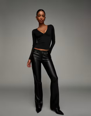 Bershka Leather effect boot-cut trousers in black | ASOS (Global)