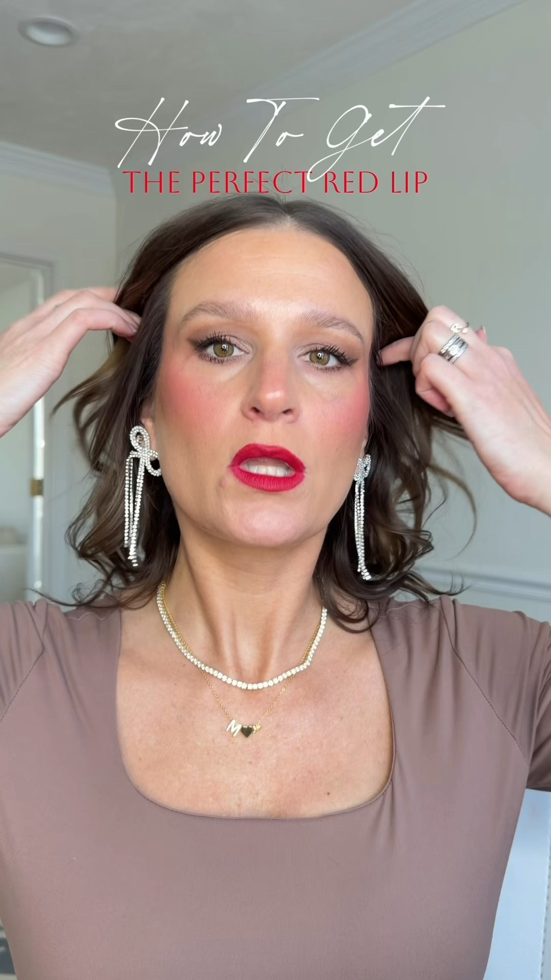 Want to rock a red lip this holiday season with confidence? Then follow these tips for applying a bold red that will last!

Products used:
Maybelline Superstay matte Ink in Pioneer
Maybelline Lifter Liner in Main Character 
Saie Airset in Translucent 

#LTKHoliday #LTKOver40 #LTKBeauty