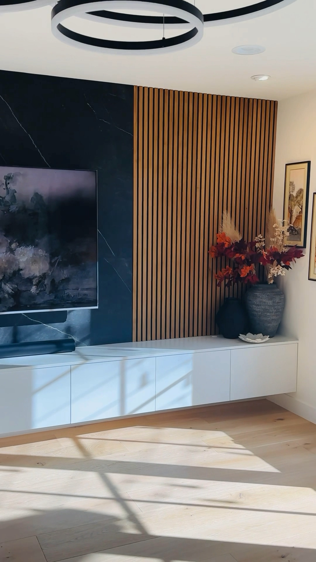 ✨ Before/After of our Media Wall✨

The wooden slats with the contrasting black honed porcelain slab and white cabinets provide the perfect backdrop of our living room!

Follow along @onesqftatime as we share our #makingourhouseahome journey!

#frombuildtobuilt #ourbuildjourney #homebuilding #ourbuildingjourney #homebuild #transitionaldesign #homebuildingandrenovating #neutraldecor #ourbuild #ikeahome #bedrosianstile #woodupp #decorilla



#LTKHome
