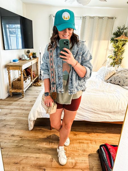 Spending the day at the LA zoo with the fam! Wearing an oversized graphic tee and pulling colors with bike shorts, purse strap, sneakers and hat to pull the whole look together. 

Travel outfit - casual mom outfit - on the go- summer outfit