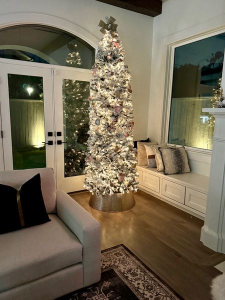 🎄 Christmas Decor 🎄

A tall tree doesn’t have to take up a lot of space. This 9ft flocked tree is slim so the base width is much smaller than our regular sized 9ft tree. This one is full when fluffed and gorgeous!

Silver, golds, and soft pinks keep our decor more neutral this year with some personalized ornaments mixed in. 

Did you know Better Homes & Gardens has the best pillows? I was excited to order them when we moved and added pillows to two window seats. We mixed neutrals with blacks and just love it! 

#everypiecefits

Christmas Tree Decor
Holiday Decor
Family Room Decor
Den Decor
Living Room Decor

#LTKCyberWeek #LTKhome #LTKHoliday