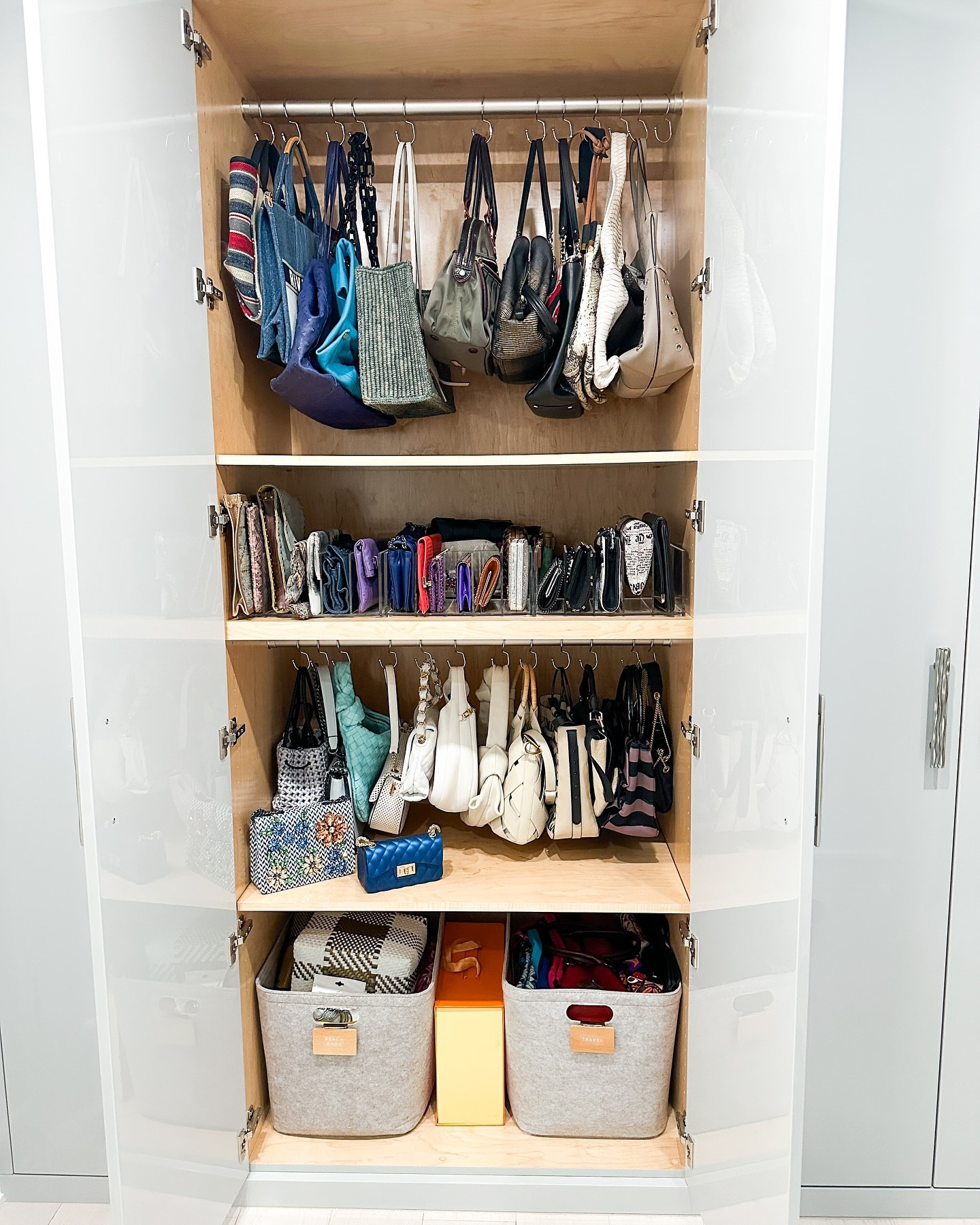 A closet just for purses? 👜 yes please!

Our client has so many beautiful bags but they were getting lost in her clothes closet 🫠 the solution? We cleared out this under utilized closet in the next room and created a haven just for purses 🤩

So how did we achieve this look? ✨

▫️These purse hooks from @thecontainerstore are super affordable and are a great way to organize your bags while maximizing space 🙌🏻

▫️We LOVE using these luxe acrylic collators to organize clutches 😍 they truly elevate the look of the space

▫️One of our go-to products to contain larger categories are these felt bins from target 🎯 they fit SO much and can be used in any room

Spring is the perfect time to get organized 🌸 whether you need help decluttering your closet, cleaning out your garage or creating a functional mudroom, as your organizing besties, we can help you tackle any space 💪🏻 

Click the link in bio to inquire today or shop the products from this space 💌
.
.
.
.
.
#organizewithmarie #fairfieldcountyct #connecticutlife #organizingtips #connecticutliving #connecticutgram #ctsmallbusiness #203local #organizedhome #fairfieldcounty #fairfieldcountymoms #greenwichct #hometips #professionalorganizer #getorganized #organizinghacks #homeorganizer #homeorganizing #womeninbusiness #smallbusiness #smallbusinessowners #thecontainerstore #TheContainerStoreAmbassador #closetorganization #purseorganizer