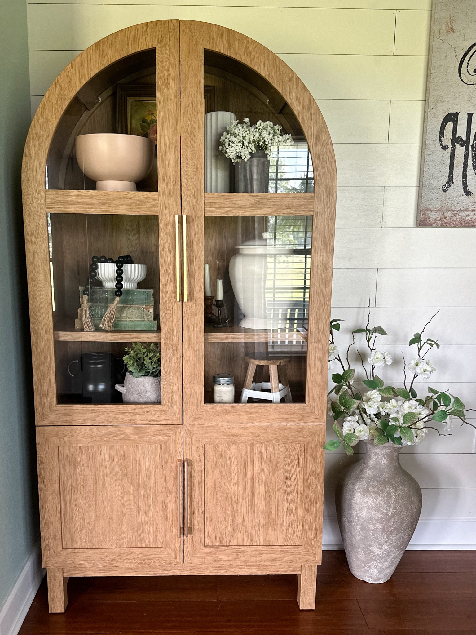 The Better Homes & Gardens arch cabinet in the light honey color is back in stock! 🏃‍♀️🏃‍♀️ Less than $400! I added different handles to elevate the look. 

#LTKHome