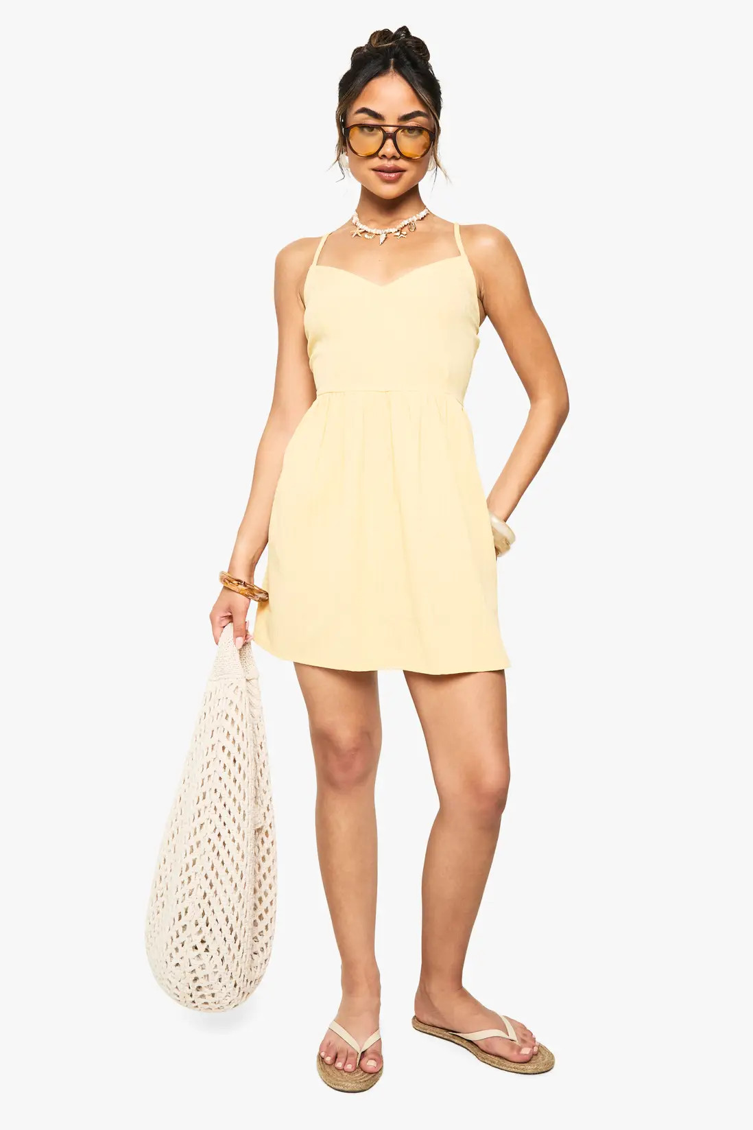 Lemon Textured Crinkle Strappy Mini Dress | Boohoo | Boohoo.com (UK & IE)