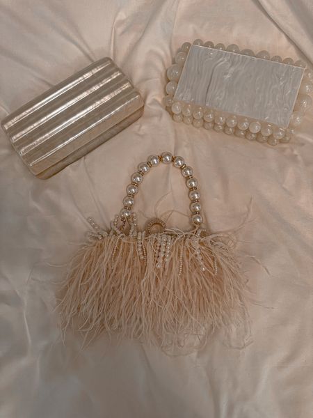 Amazon clutches 
Looks like cult Gaia 
Wedding shoes
Hair pearls 

#wedding #pearl #feather #amazon #laurabeverlin

#LTKunder50 #LTKunder100 #LTKwedding