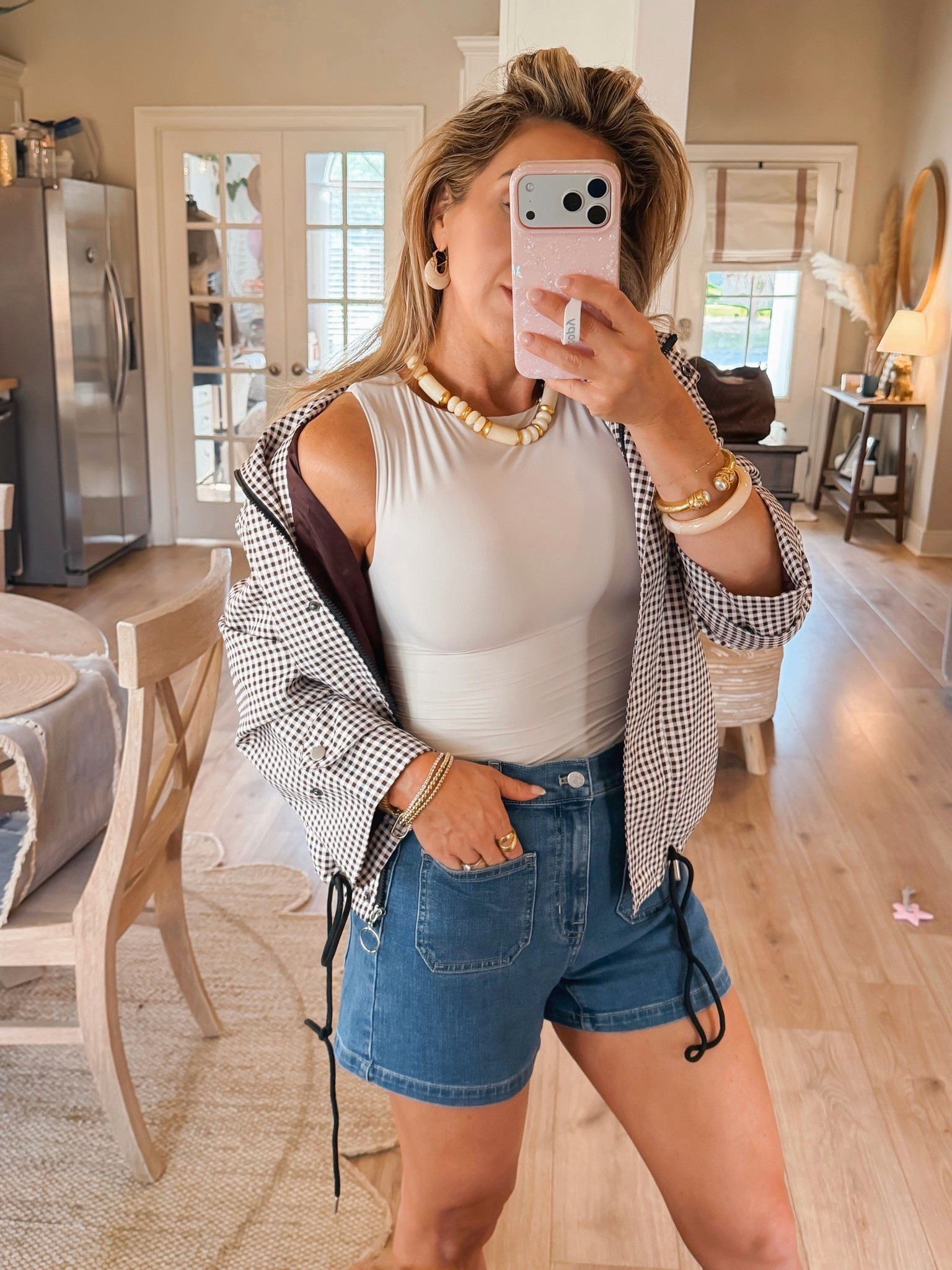 The weather’s not quite ready for fall yet, but I’m finding ways to layer cute jackets with sleeveless top and denim these days.

Chocolate brown gingham cropped trench jacket, cropped trench coat, early fall outfits women, fall transition outfits, fall jackets, bomber jacket

#LTKootd #LTKOver40 #LTKgrwm