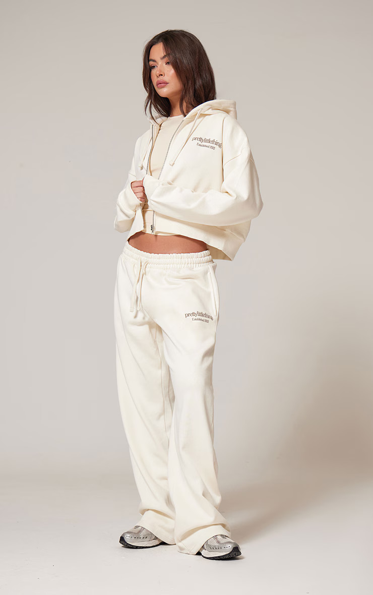 PRETTYLITTLETHING Cream Premium Print Wide Leg Joggers | PrettyLittleThing UK