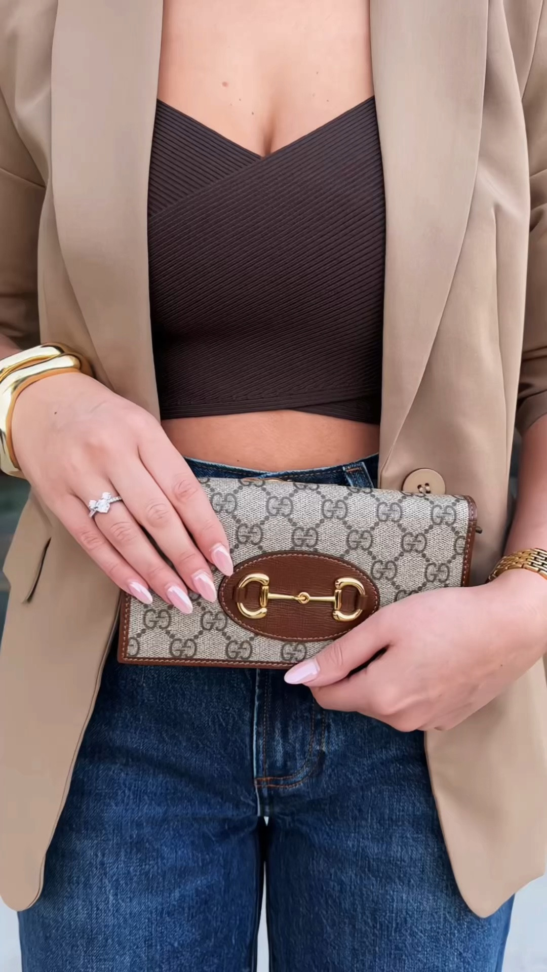 Effortless old money style meets fall chic in this perfectly curated outfit. I paired a classic Amazon tan blazer with Aritzia high-rise wide-leg jeans for that polished yet laid-back vibe. To elevate the look, I added a sleek brown cropped top, also from Aritzia, creating a seamless neutral palette. These comfortable yet stylish Sam Edelman block heels are perfect for an all-day outing, while my Gucci monogram clutch and belt add a touch of timeless luxury. For accessories, I kept it simple with bold Amazon jewelry pieces that give off a quiet luxury aesthetic. This look is perfect for a casual lunch, date night, or even a day at the office. Shop the entire look on my LTK and bring effortless, chic vibes to your fall wardrobe!

#FallChic #OldMoneyStyle #Aritzia #SamEdelman #Gucci #Amazon #NeutralOutfit #CasualChic #FallOutfitInspo #ClassicStyle #FallWardrobe #CapsuleWardrobe

old money fashion, neutral fall outfit, classic style, chic fall outfits, casual chic, quiet luxury, Parisian chic, capsule wardrobe, fall neutrals, fall chic, fall outfits petite, fall going out outfits, fall vacation outfits, fall work outfits, fall transition outfits, fall fashion, fall style, date night outfits, casual dinner outfit, girls dinner outfit, everyday fall outfits, weekend outfits, coffee run outfit, shopping outfit, blazer outfit, wide leg jeans outfit, fall travel outfit, fall lunch outfit, fall brunch outfit, fall business casual, fall outfit ideas.

#LTKSeasonal #LTKItBag #LTKOver40 #LTKFindsUnder50 #LTKShoeCrush

#LTKVideo #LTKStyleTip #LTKFindsUnder100