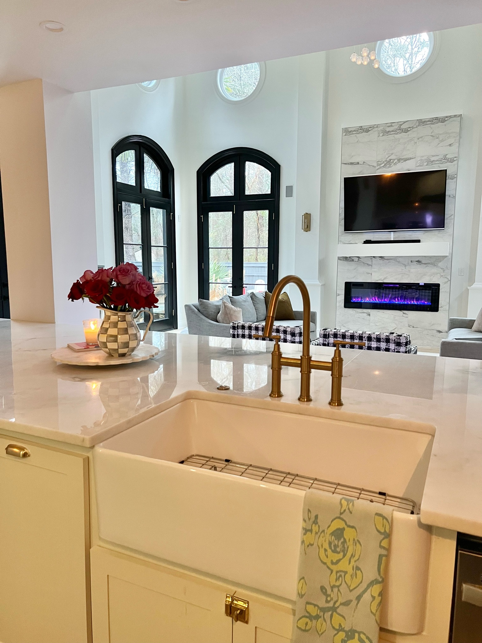 Kitchen hardware, kitchen faucet, farmhouse sink, marble countertops, hand towel, sofa, electric fireplace, pitcher 
#mackenziechilds #kitchenreno

#LTKstyletip #LTKFind #LTKhome