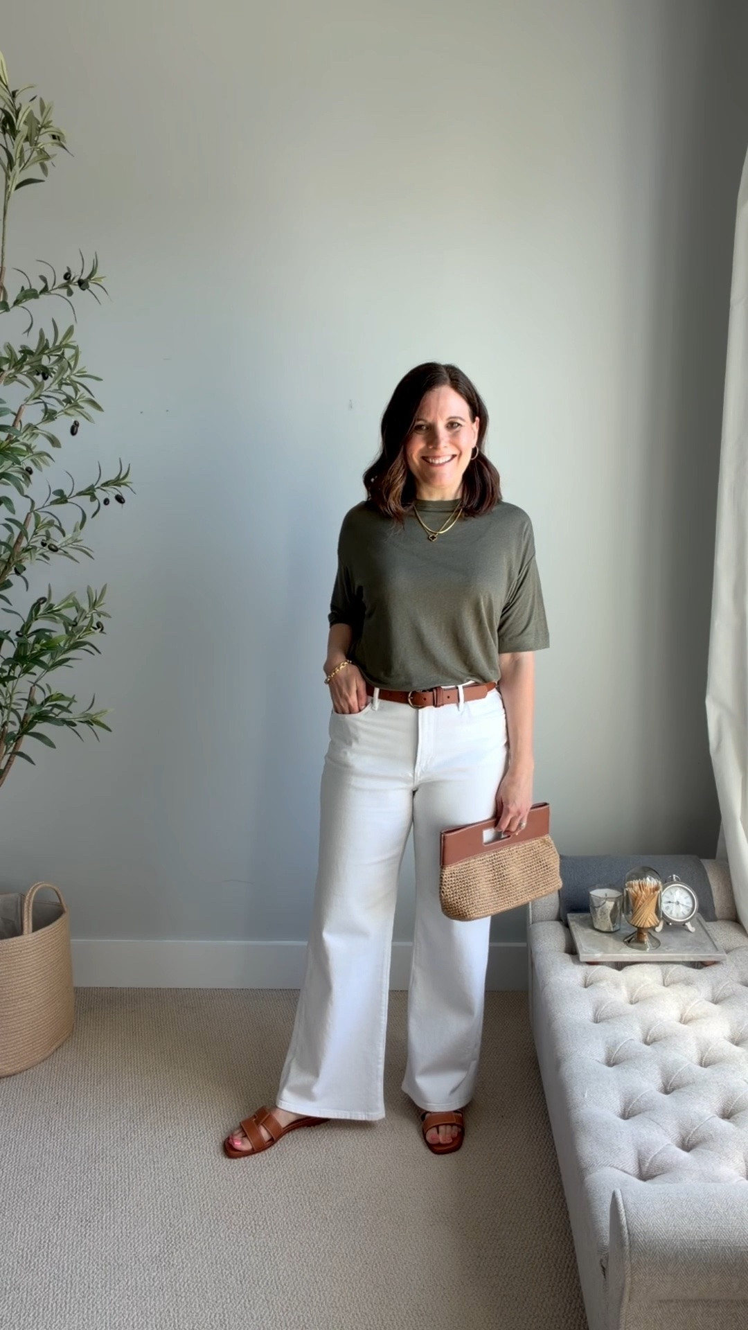 Olive green, cognac brown, and white look so sharp together. This olive tee has a relaxed fit, but it’s short.  I wear a small. I’m wearing my true size in these white jeans.

#LTKOver40 #LTKMidsize #LTKSaleAlert