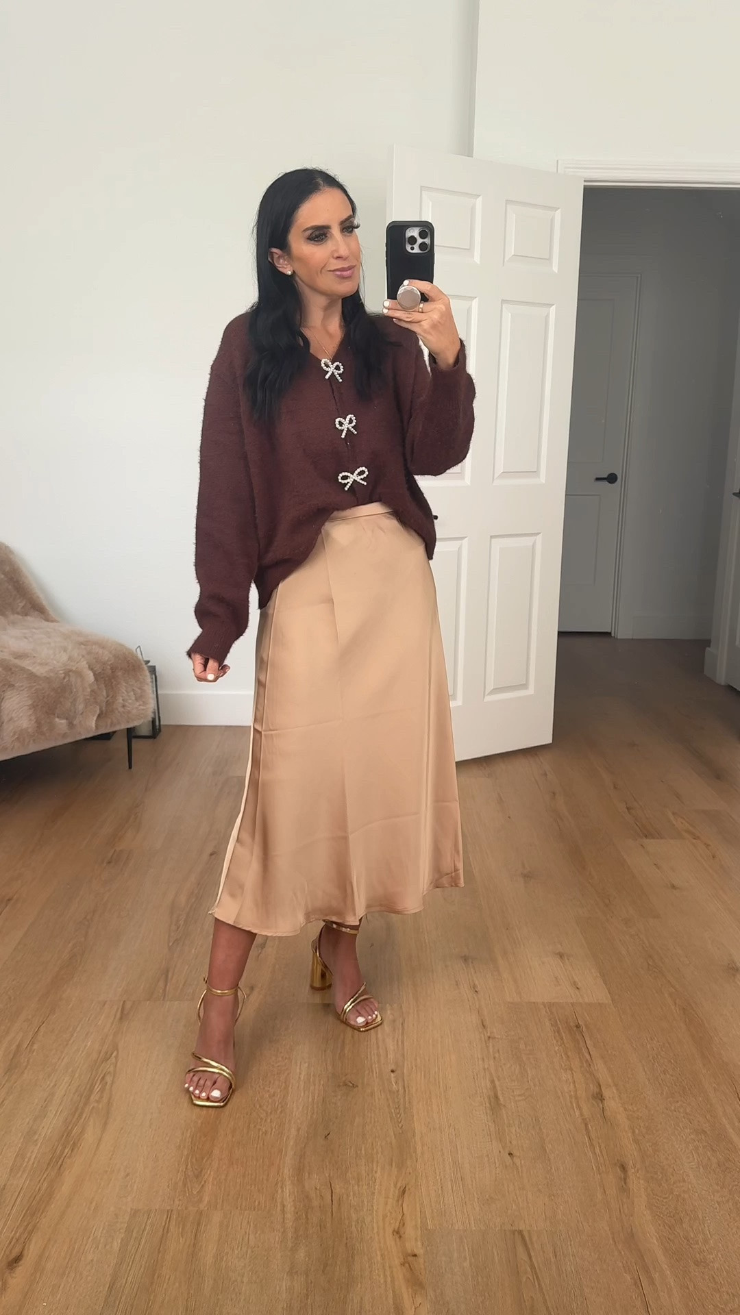 Satin Skirt Flowy A Line wearing size medium. Long Sleeve Knit Cardigan Bow Buttons wearing size small.