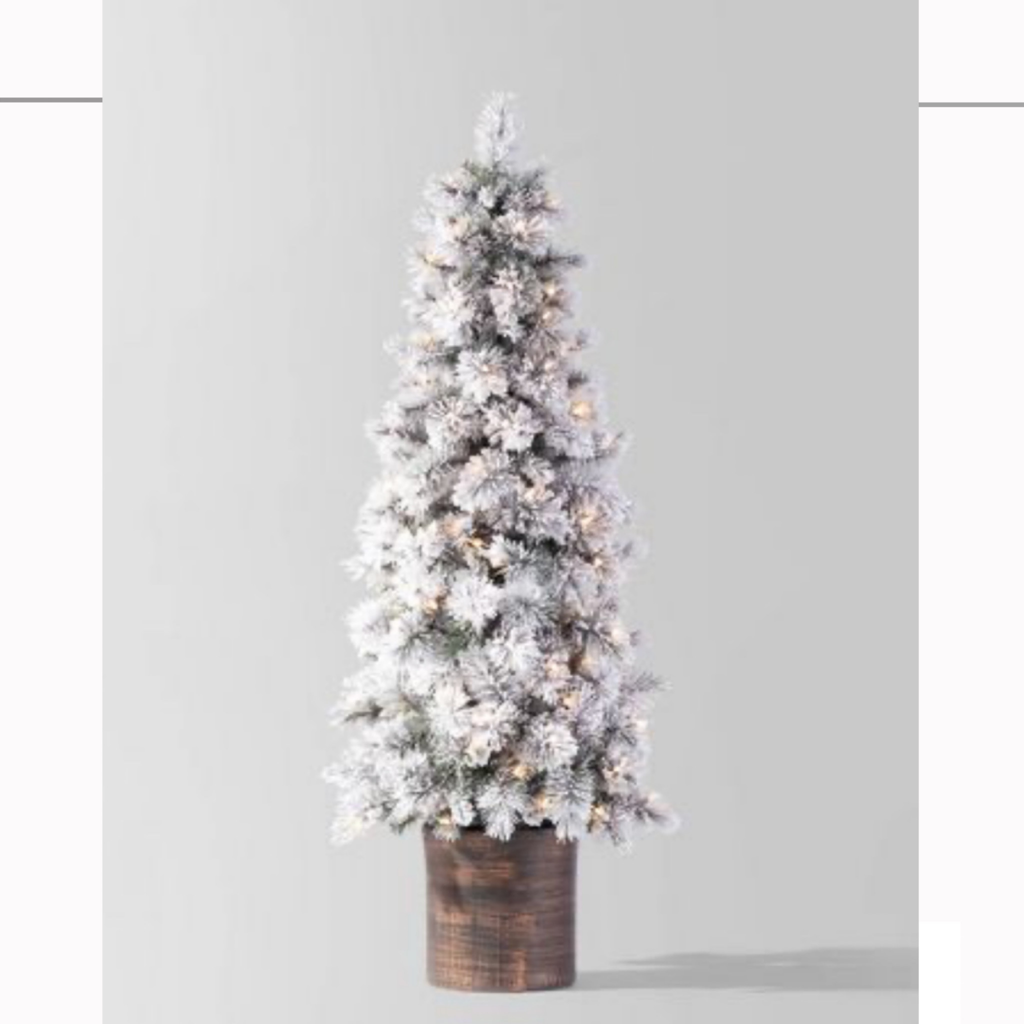 Flocked Christmas tree 

#LTKSeasonal #LTKHoliday #LTKfindsunder100