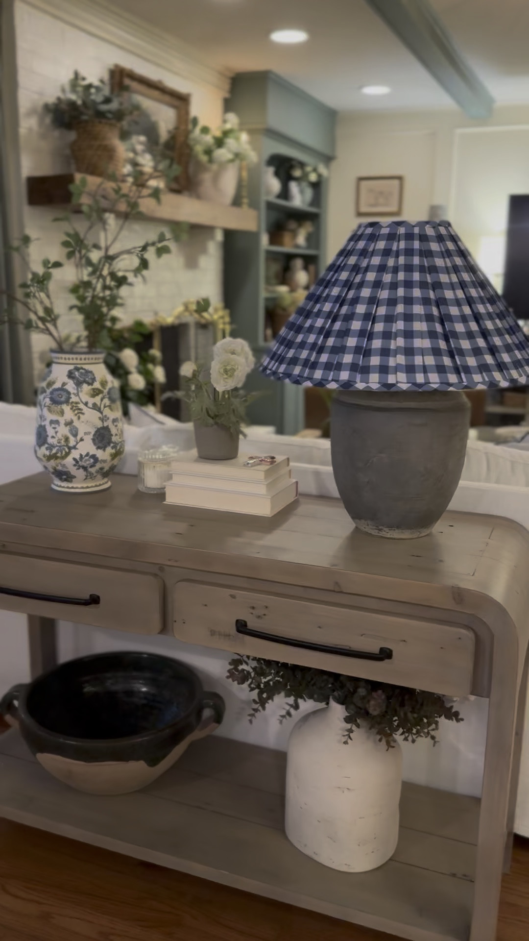 Painted floral ceramic vase, realistic greenery stems, blue gingham lampshade(I swapped the base)

#LTKSaleAlert #LTKHome #LTKSeasonal