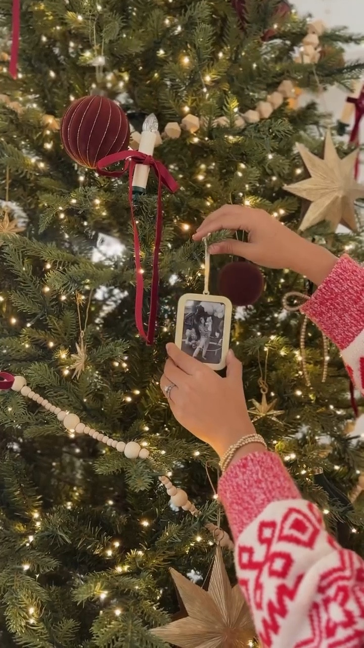 A sentimental Christmas ornament 🥹🤍🎄 loving putting some personal touches into our holiday decor this year! These cute little frame ornaments from target are so good! 

#LTKHome #LTKSeasonal #LTKHoliday