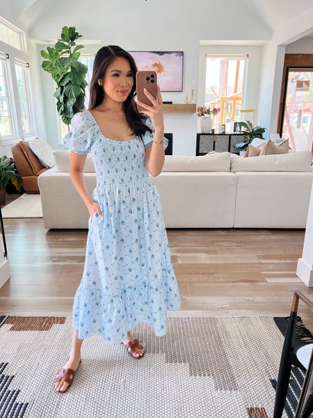 Summer outfit with this blue floral midi dress! Im wearing size XS and it fits TTS. I love the smocked waist, scooped neckline, and puff sleeves. Has been perfect for postpartum and would be great for maternity, too! This pattern is sold out, but linking other patterns in the same style 

#LTKstyletip #LTKSeasonal