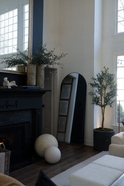 I cannot handle how good this modern living room turned out. The natural light pouring through the windows, the olive tree, soft neutral seating, and warm wood tones make everything feel bright and peaceful. All the layered textures and sculptural details created that cozy minimalist luxury look and it genuinely feels like a designer showcase space!! 

#houseofvalentina @houseofvalentina

 

 #LTKOver40 #LTKHome #LTKSaleAlert