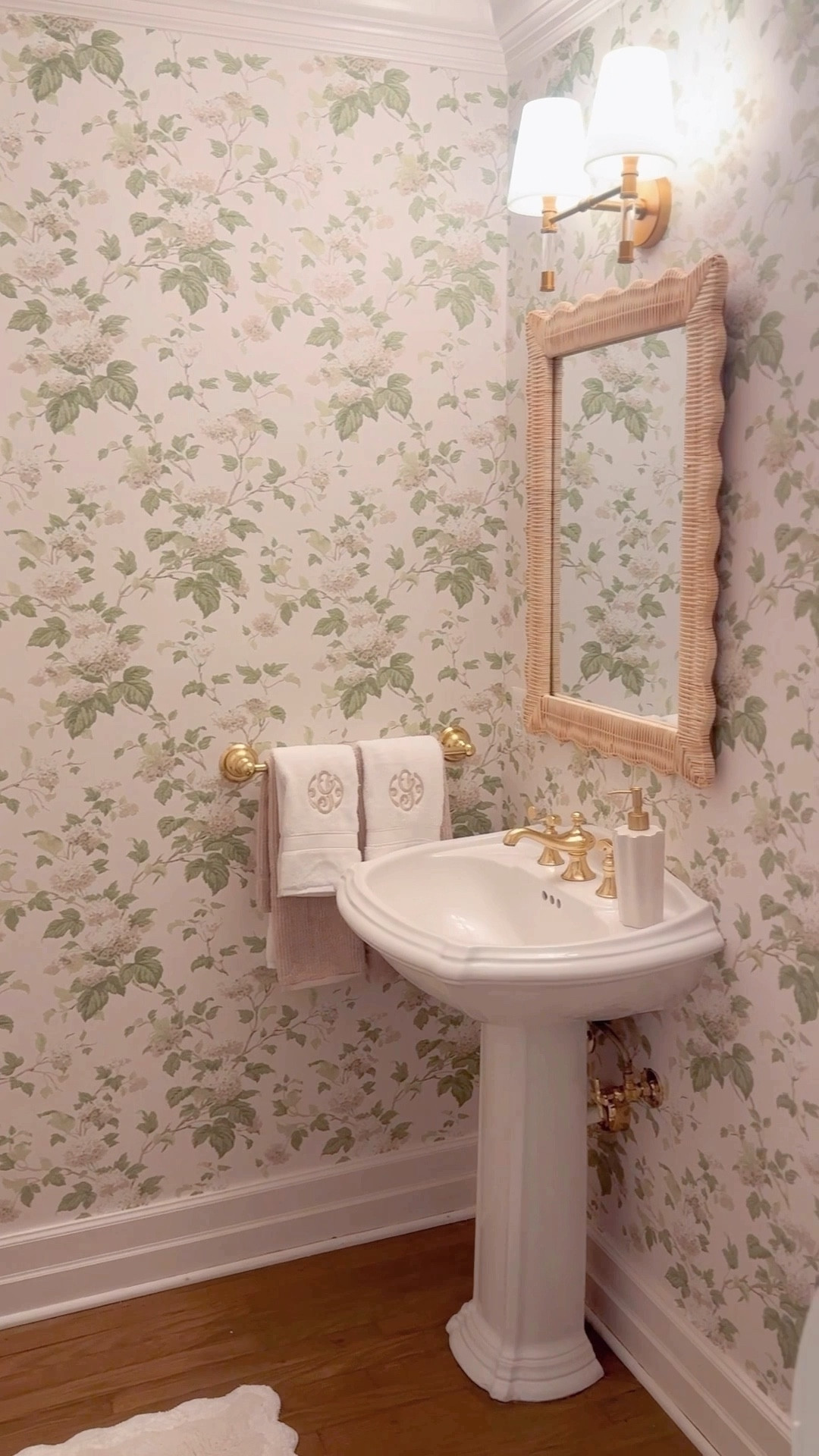 Chic powder room. Colefax & Fowler ivory leaf wallpaper. Ivory, floral, & green guest bathroom decor. 

#LTKFindsUnder100 #LTKFindsUnder50 #LTKHome