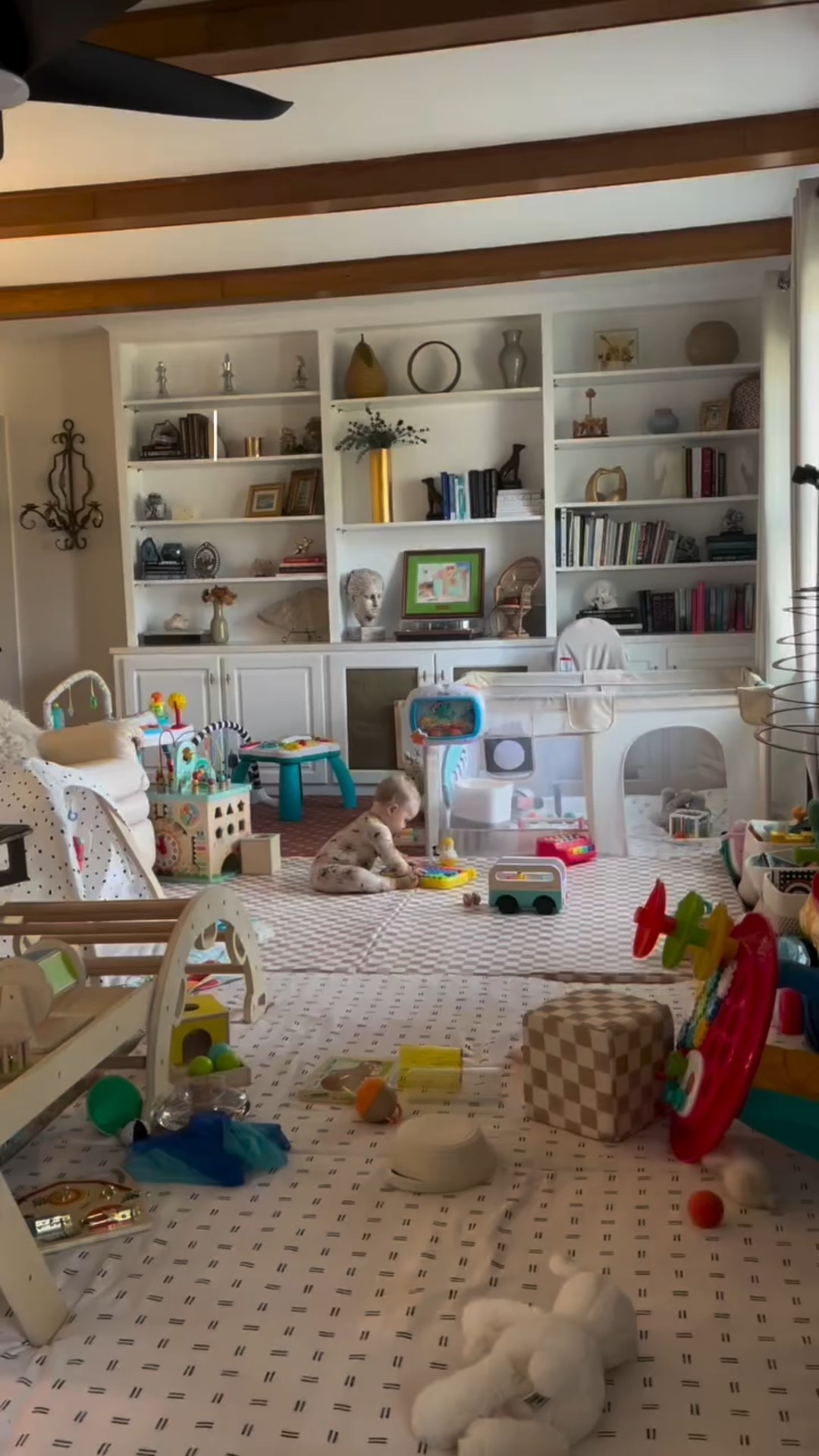 My living room looks like a daycare now but her toy opportunities are endless 🫶🏻😂😅
•
•
• 
•
 #independentplay #baby #sahm￼