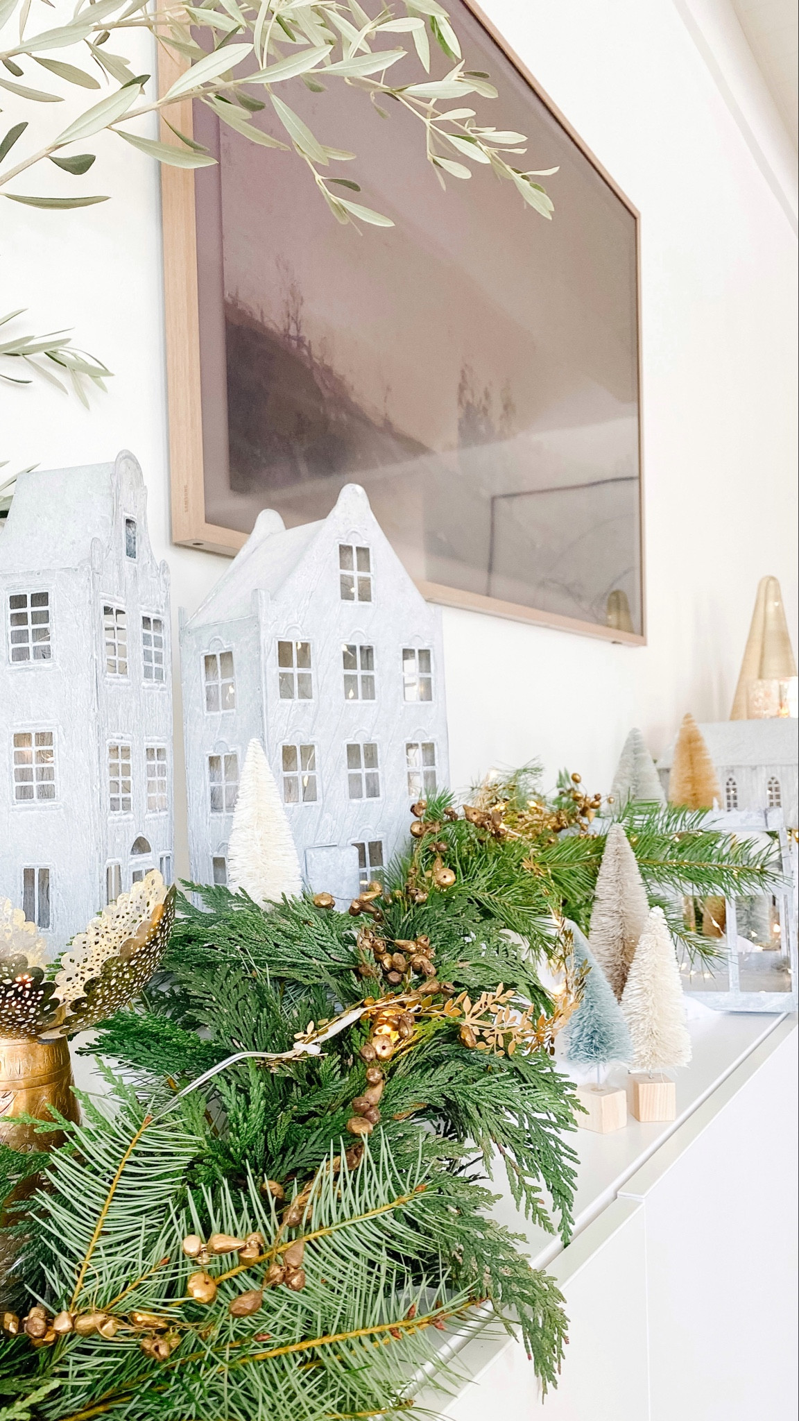 Christmas village.

Christmas decor, holiday garland, holiday decor, Christmas garland, Christmas houses, Concordville village, metal leaf garland, bottle brush Christmas trees, fairy lights, mercury candleholders. 

#LTKfindsunder100 #LTKHoliday #LTKSeasonal