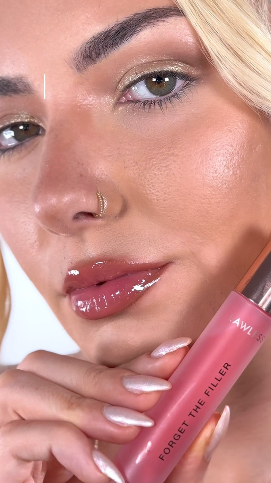 🍦🍒 Cherry Vanilla Lip Gloss 🍒🍦

10/10 lip gloss!! Absolutely love how plump this gloss makes the lips look! This has the perfect hook applicator that grips the lips and deposits product perfectly! 

Products used: 
@lawlessbeauty Forget The Filler Lip Gloss in Cherry Vanilla

#LTKBeauty #LTKFindsUnder50 #LTKVideo