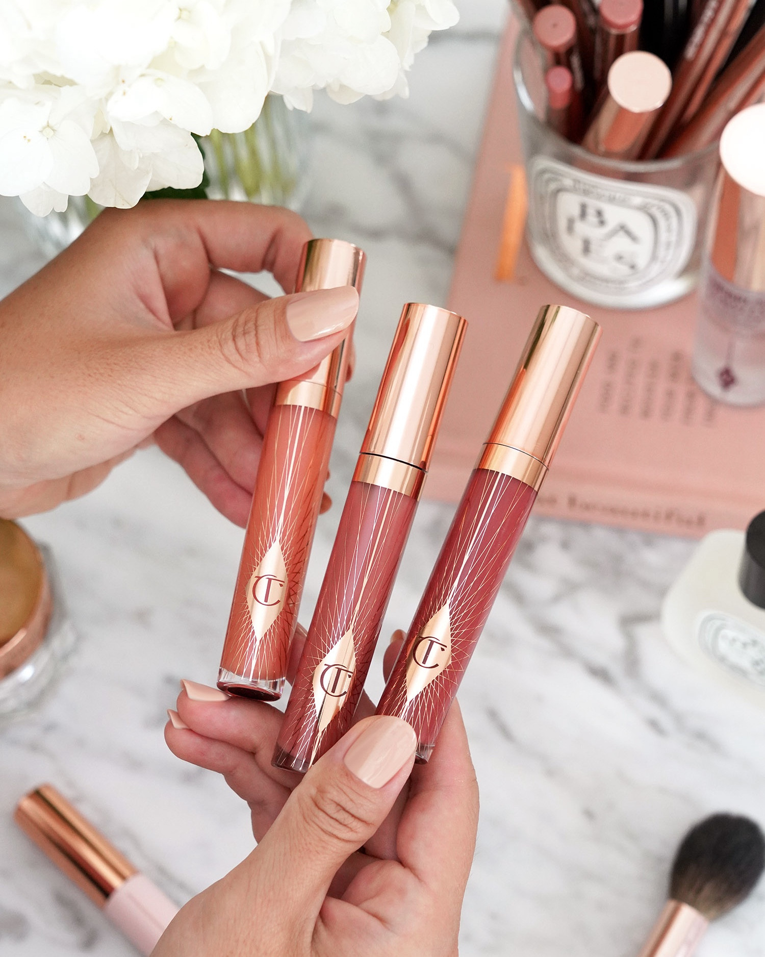 Charlotte Tilbury Collagen Lip Bath in

Refresh Rose (light pink)
Pillow Talk (nude pink rose)
Walk of No Shame (deeper rose)