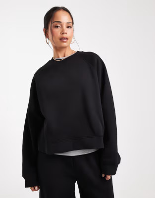 ASOS DESIGN oversized brushback sweatshirt with raglan detail in black | ASOS (Global)