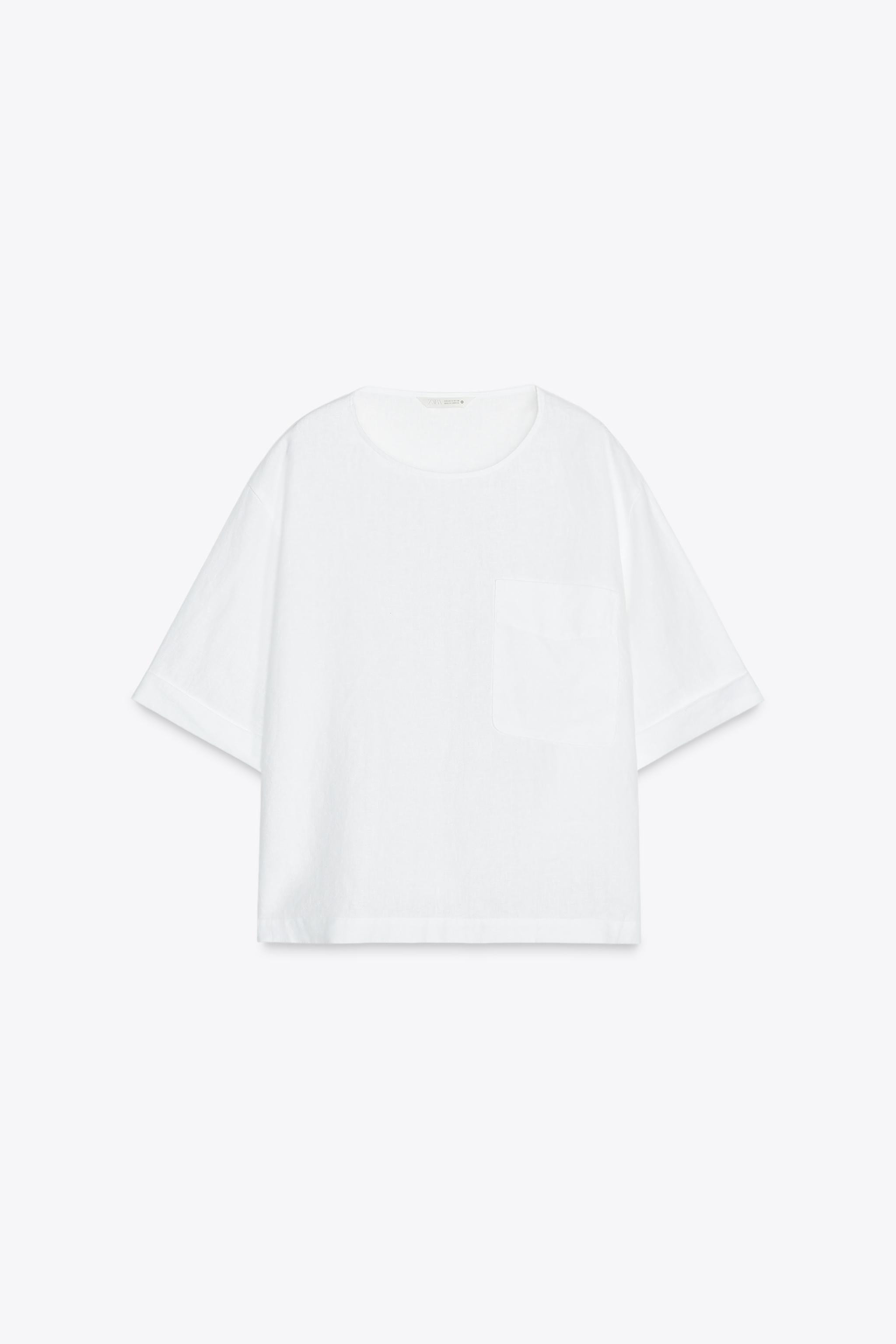 ZARA WOMAN COLLECTIONBlouse made from 100% linen yarn. Round neck and short sleeves. Chest patch ... | Zara UK