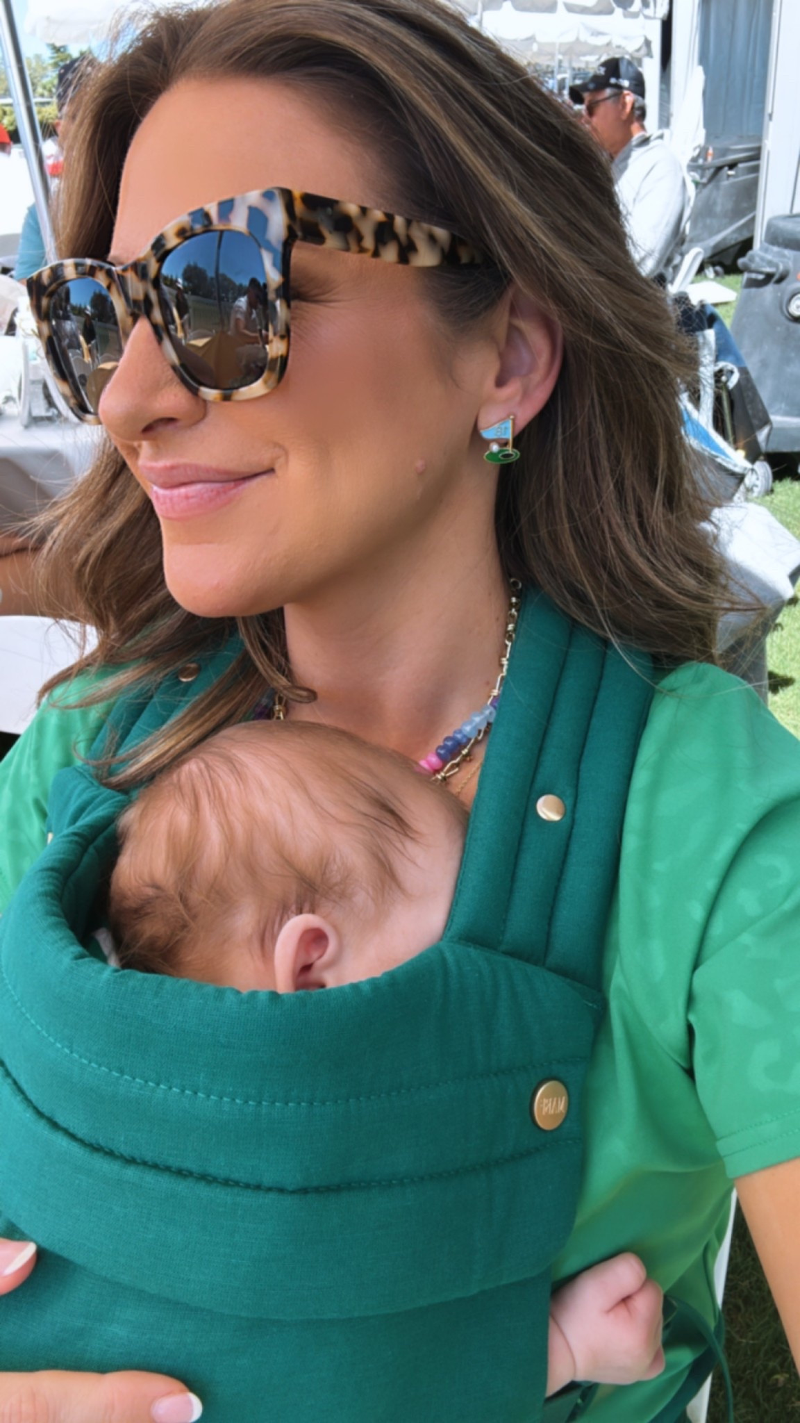 Golf tournament in a small top and skirt from Emily McCarthy, small cardigan, sneakers, sunglasses, earrings, necklaces and baby carrier from Amazon. 

#LTKBaby #LTKSeasonal #LTKStyleTip
